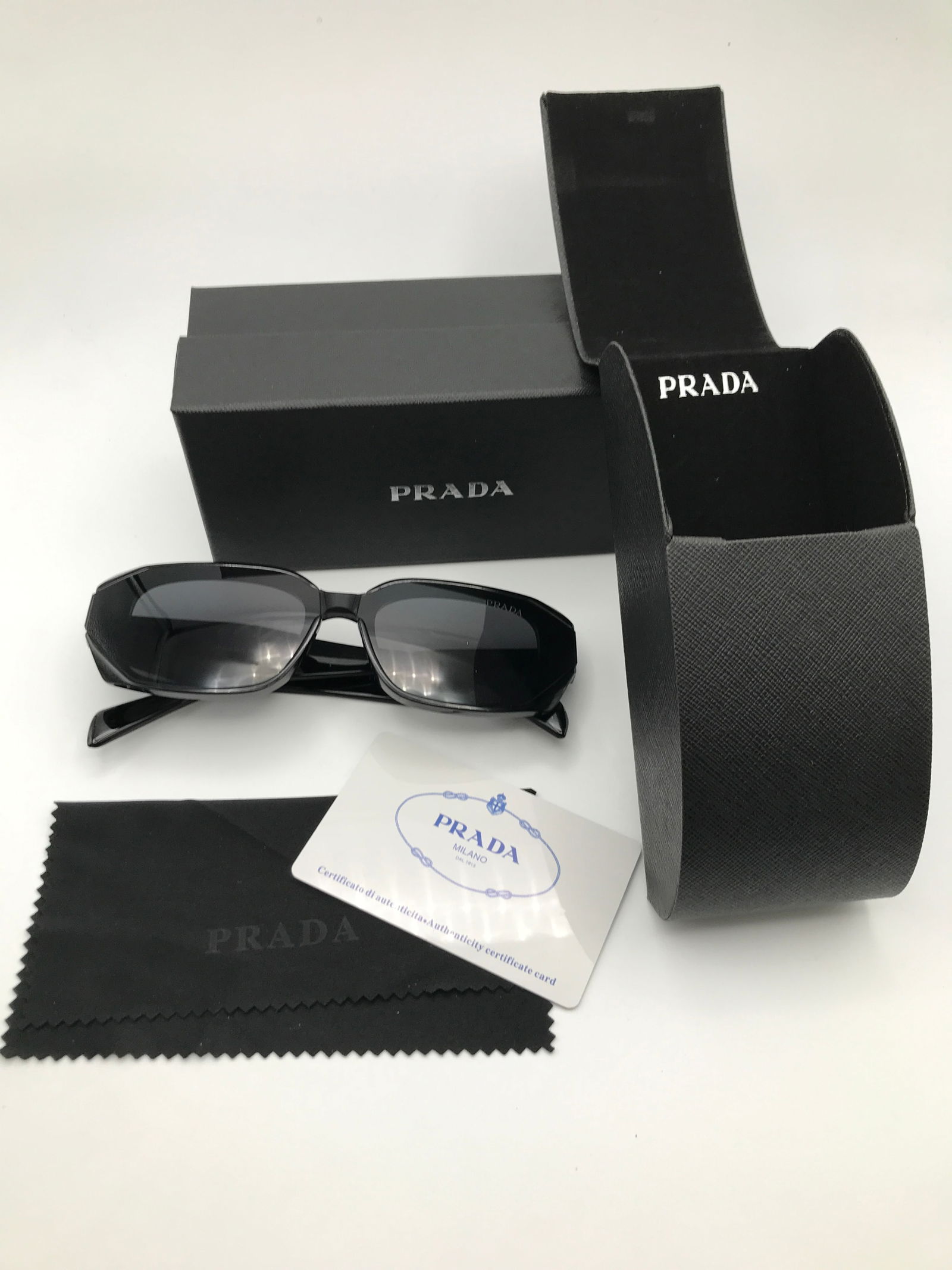 BRAND NEW PRADA SUNGLASSES WITH CASE AND BOX: Prices are in Canadian dollars