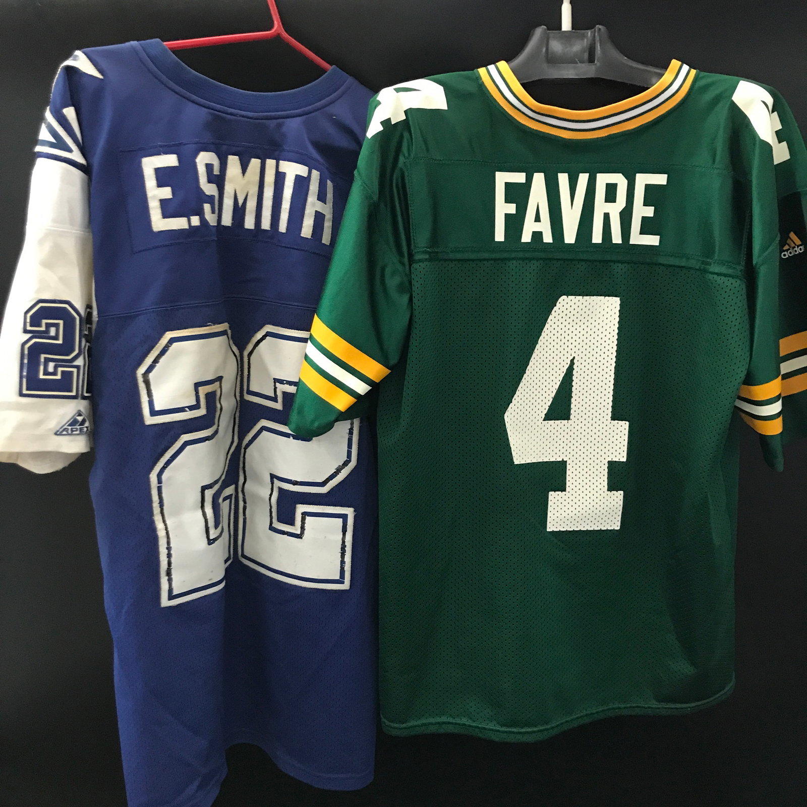 VINTAGE EMMIT SMITH AND BRETT FAVRE JERSEYS: Prices are in Canadian dollars