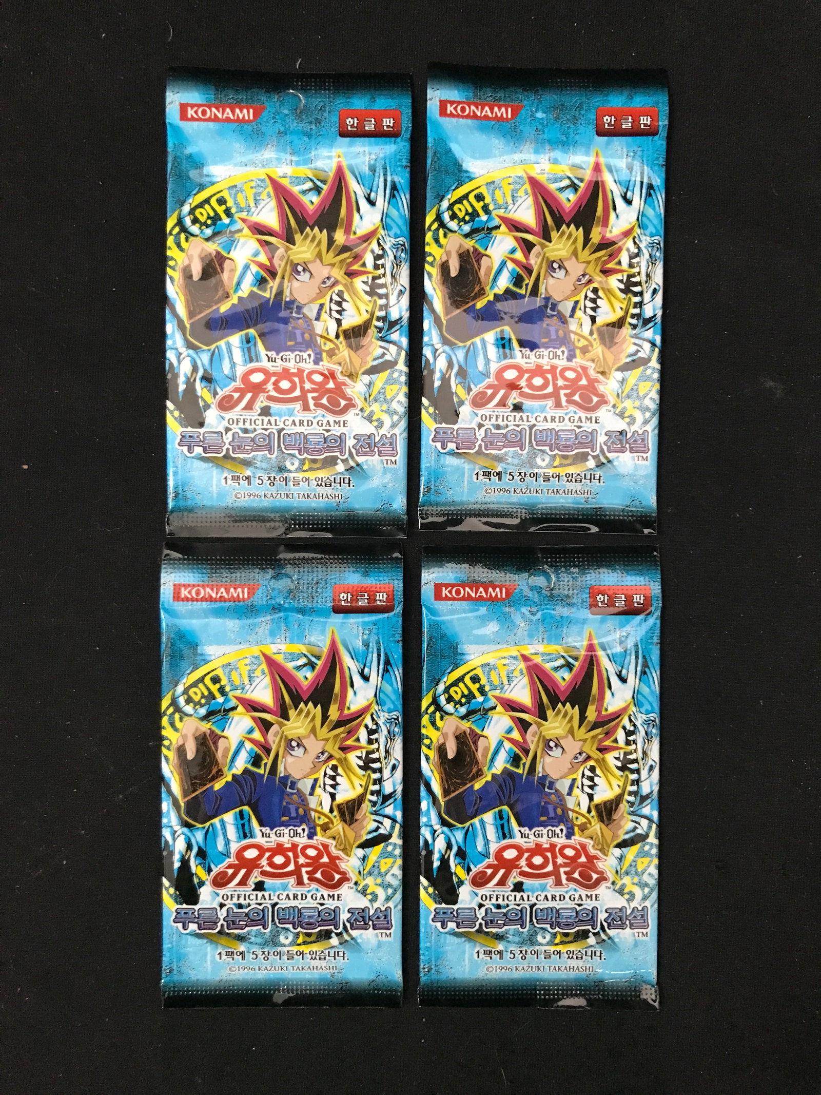 LOT OF 4 UNOPENED KONAMI YU-GI-OH LEGEND OF BLUE EYES CARD PACKS FROM KOREA: Prices are in Canadian dollars
