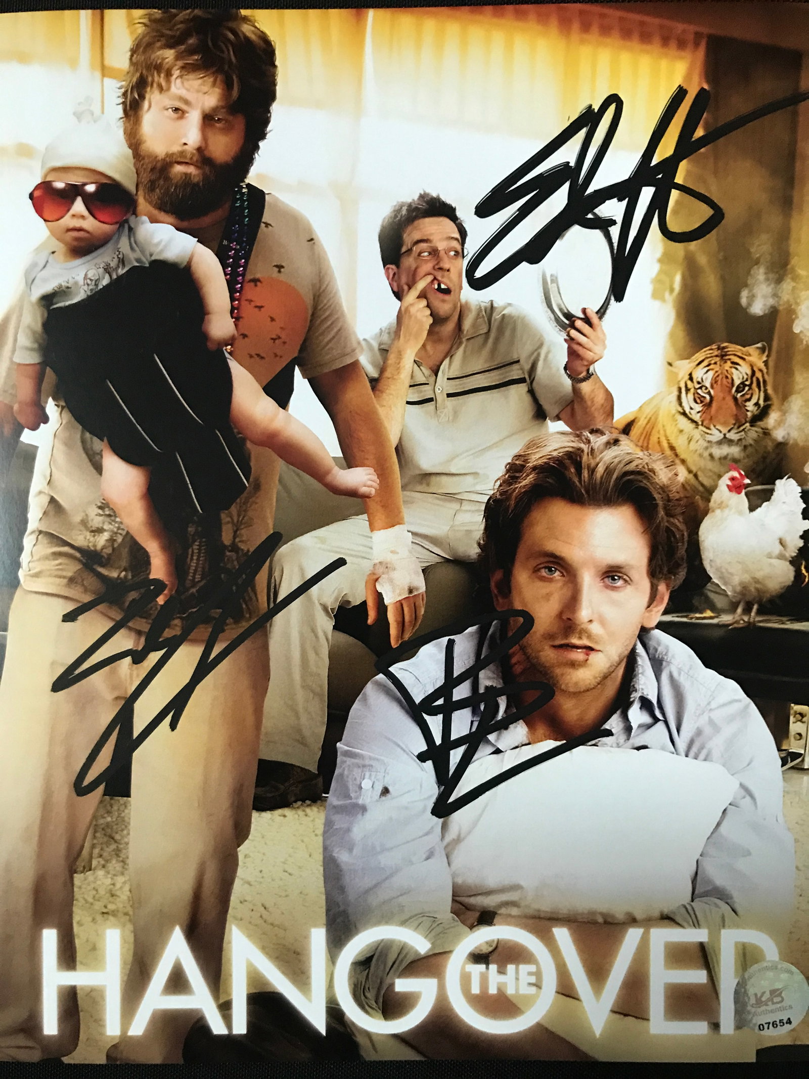 ED HELMS. BRADLEY COOPER, ZACK GILIFINAKIS SIGNED HANGOVER 8X10 - KB COA: Prices are in Canadian dollars