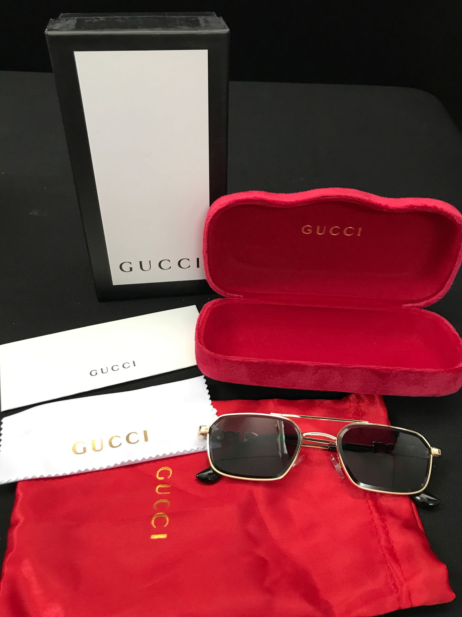 BNIB GUCCI SUNGLASSES WITH BOX AND ACCESSORIES: Prices are in Canadian dollars