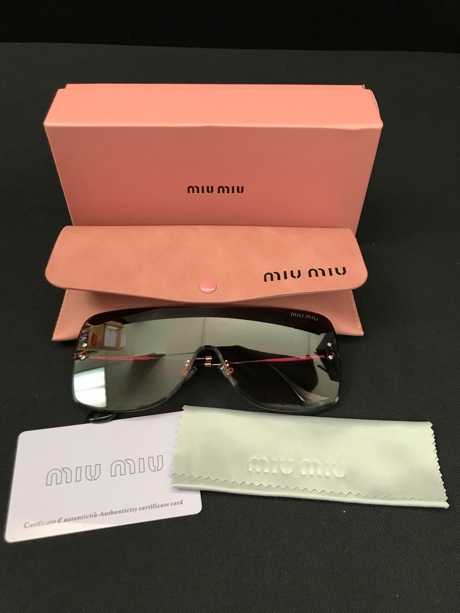 BNIB MIU MIU SUNGLASSES WITH BOX AND ACCESSORIES: Prices are in Canadian dollars