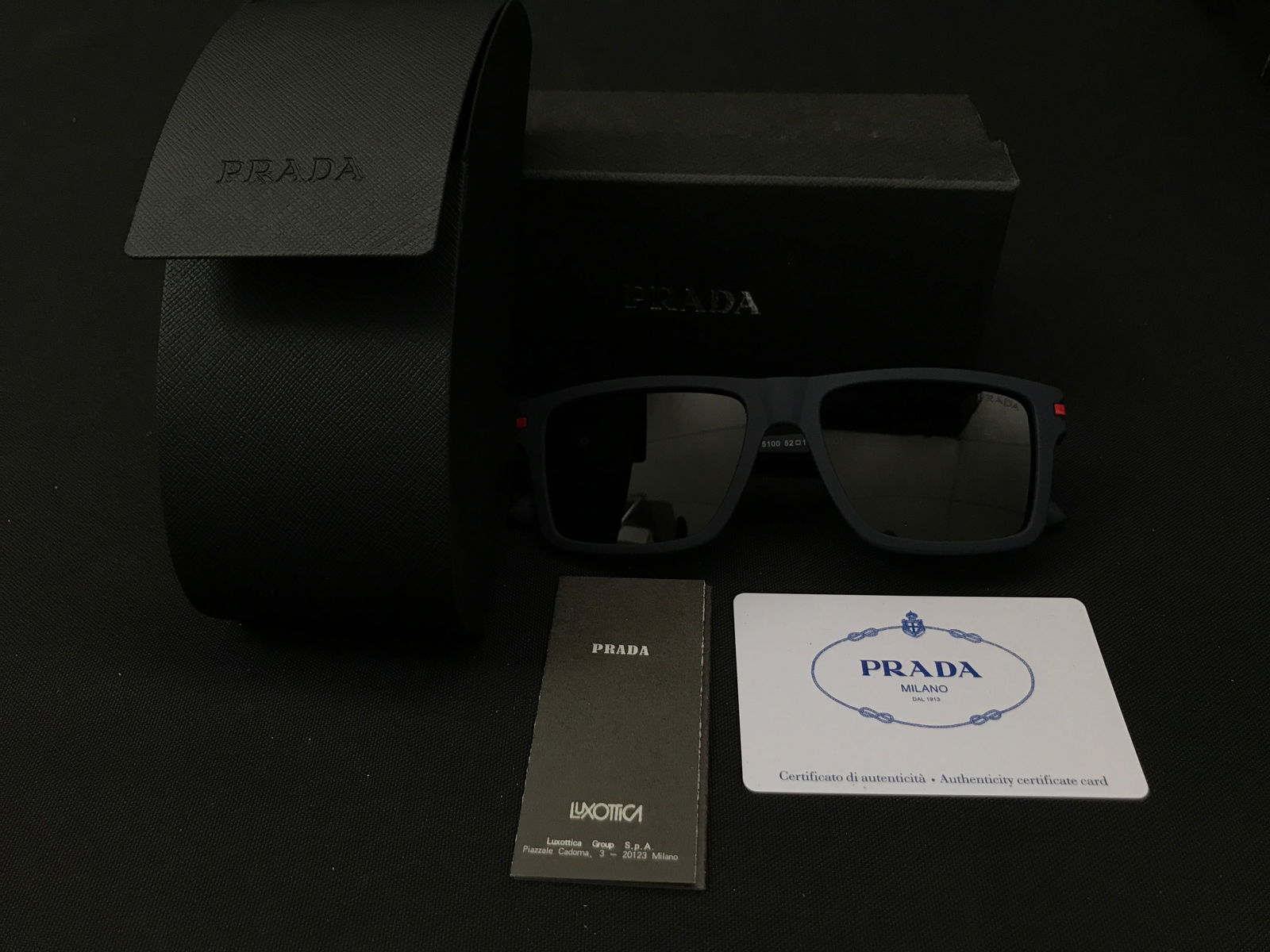 BNIB PRADA SUNGLASSES WITH BOX AND ACCESSORIES: Prices are in Canadian dollars