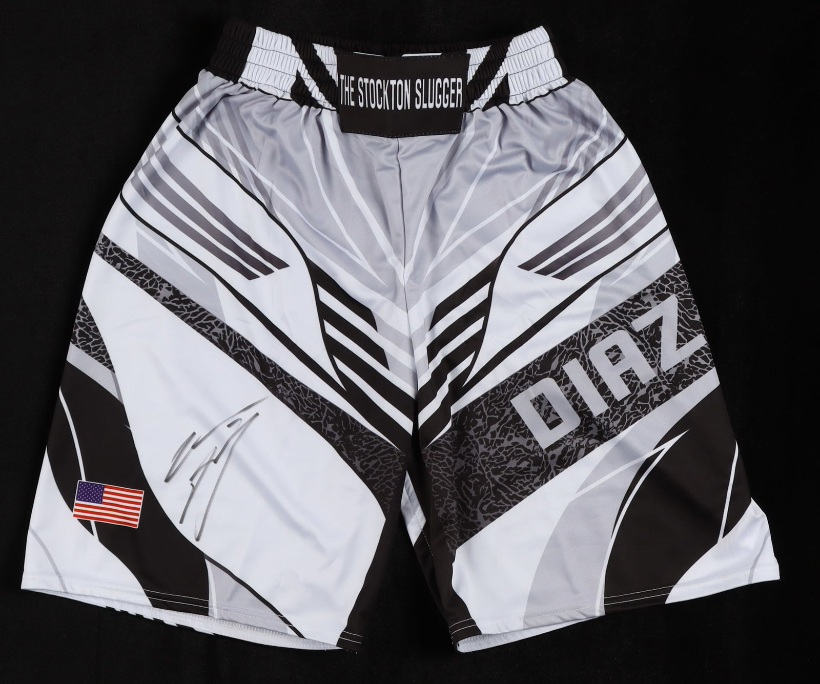 NATE DIAZ SIGNED STOCKTON SLUGGER SHORTS - BECKETT COA: Prices are in Canadian dollars