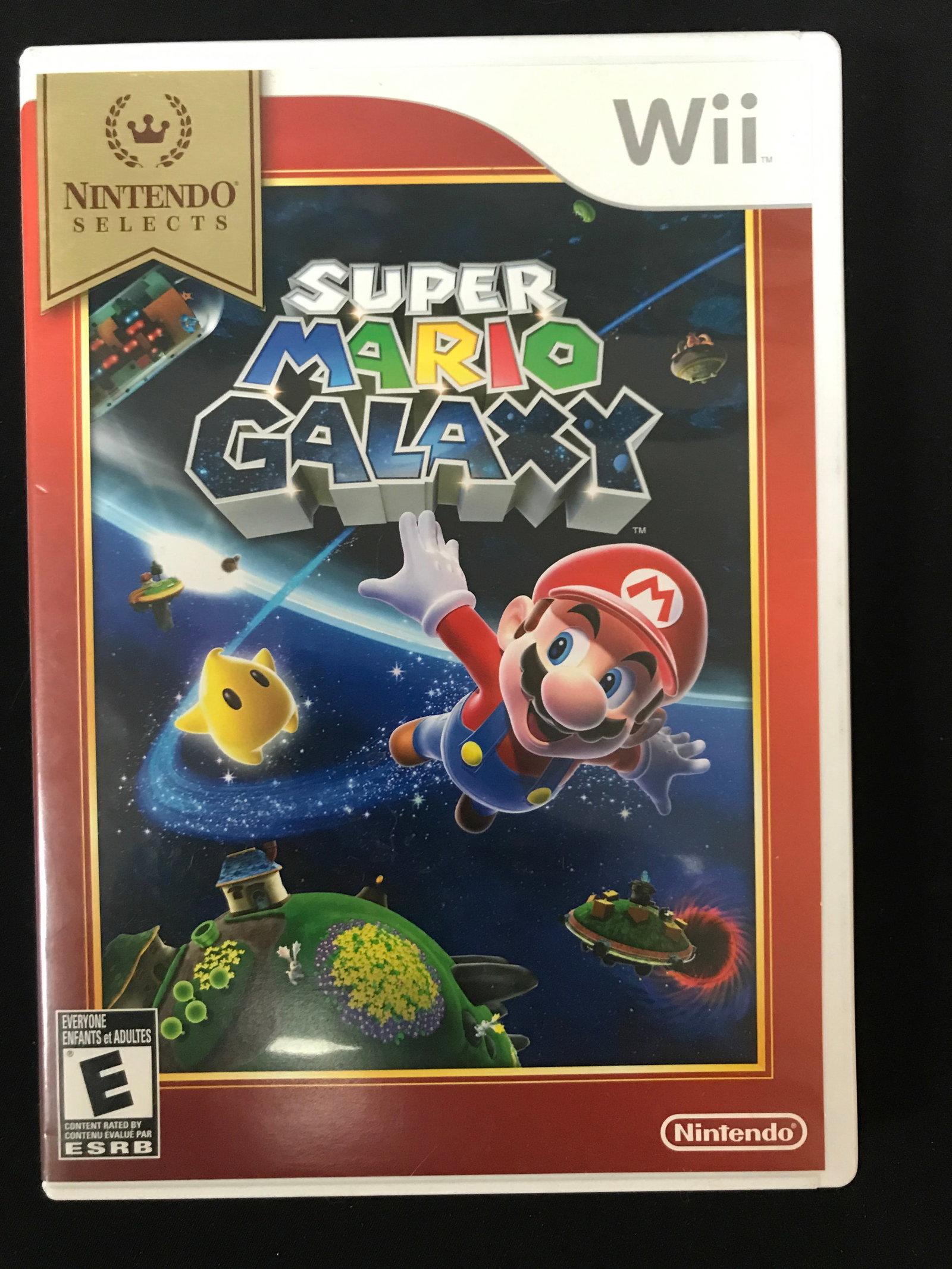 SUPER MARIO BROS WII GAME IN CASE COMPLETE WITH MANUAL: Prices are in Canadian dollars