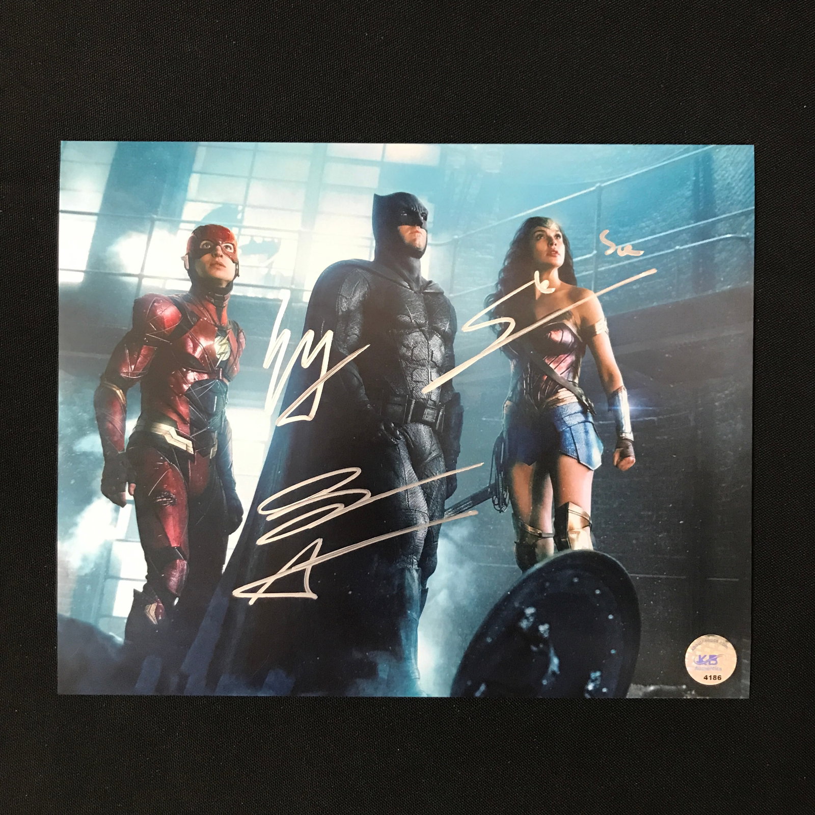 TRIPLE SIGNED JUSTICE LEAGUE 8X10 AFFLECK, MILLER GADOT - KB COA: Prices are in Canadian dollars