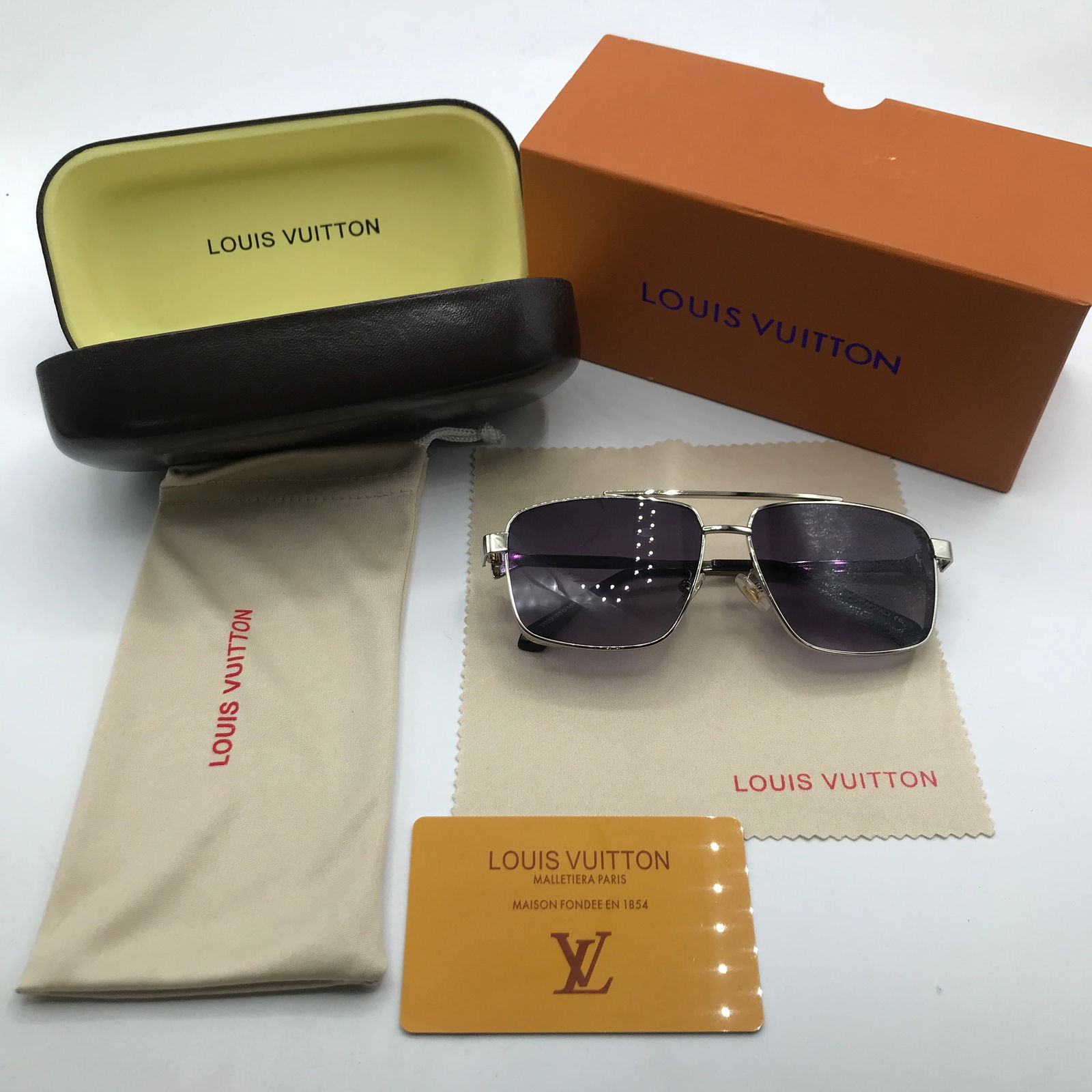 NEW IN BOX SUNGLASSES WITH CASE AND ACCESSORIES: Prices are in Canadian dollars