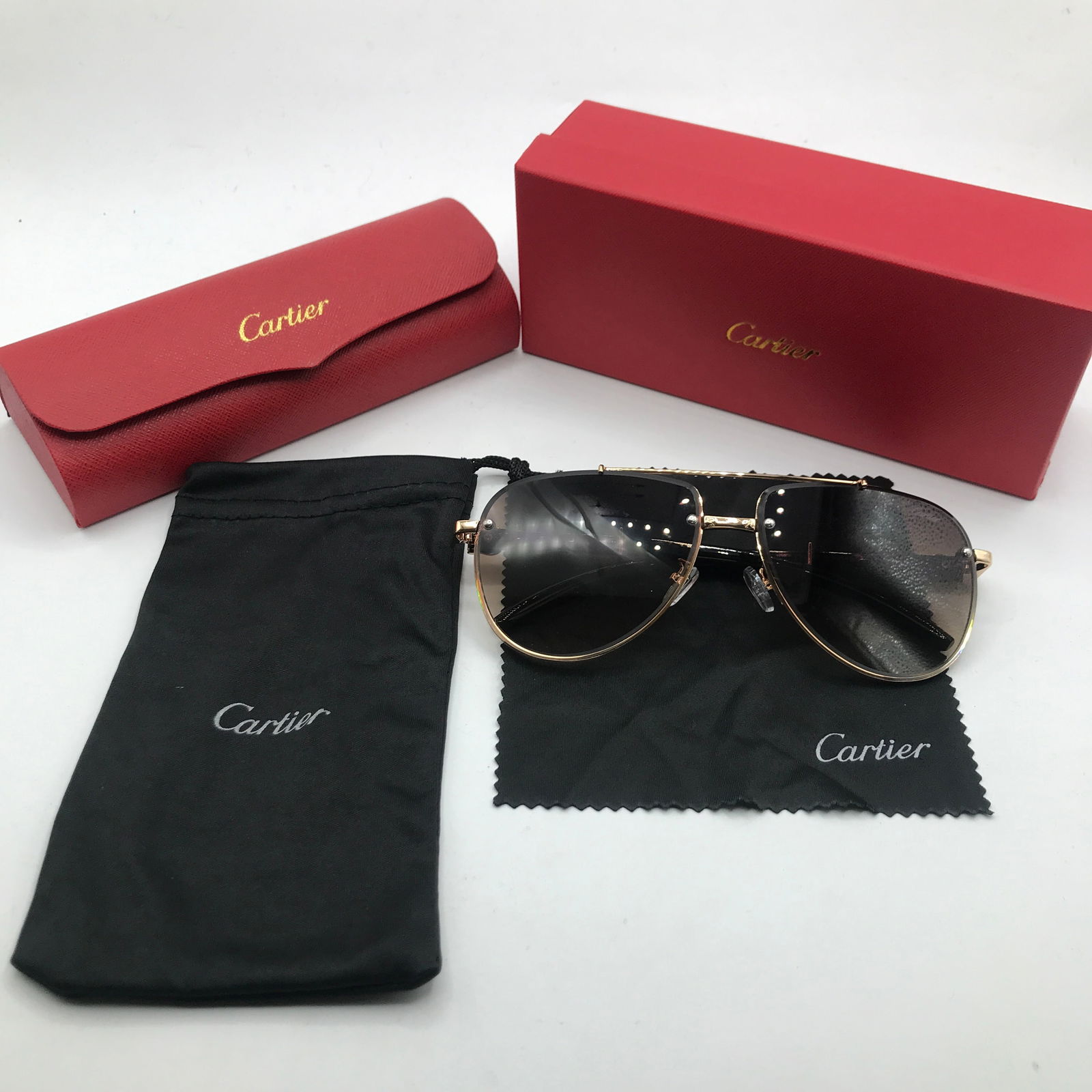 NEW IN BOX SUNGLASSES WITH CASE AND ACCESSORIES: Prices are in Canadian dollars