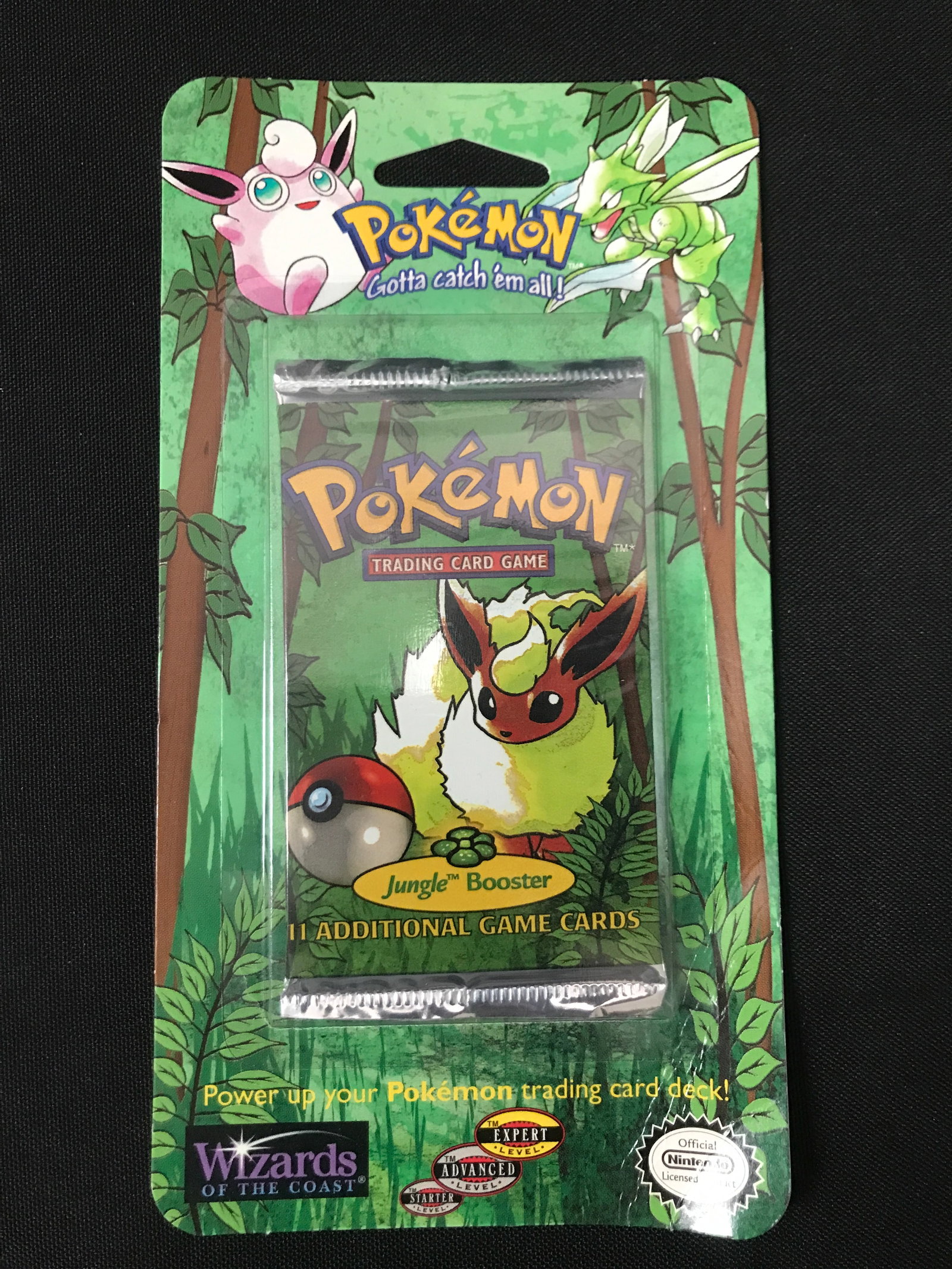 SEALED ON CARD 1999 POKEMON JUNGLE BOOSTER PACK (RETAIL VALUE 500.00-800.00): Prices are in Canadian Dollars