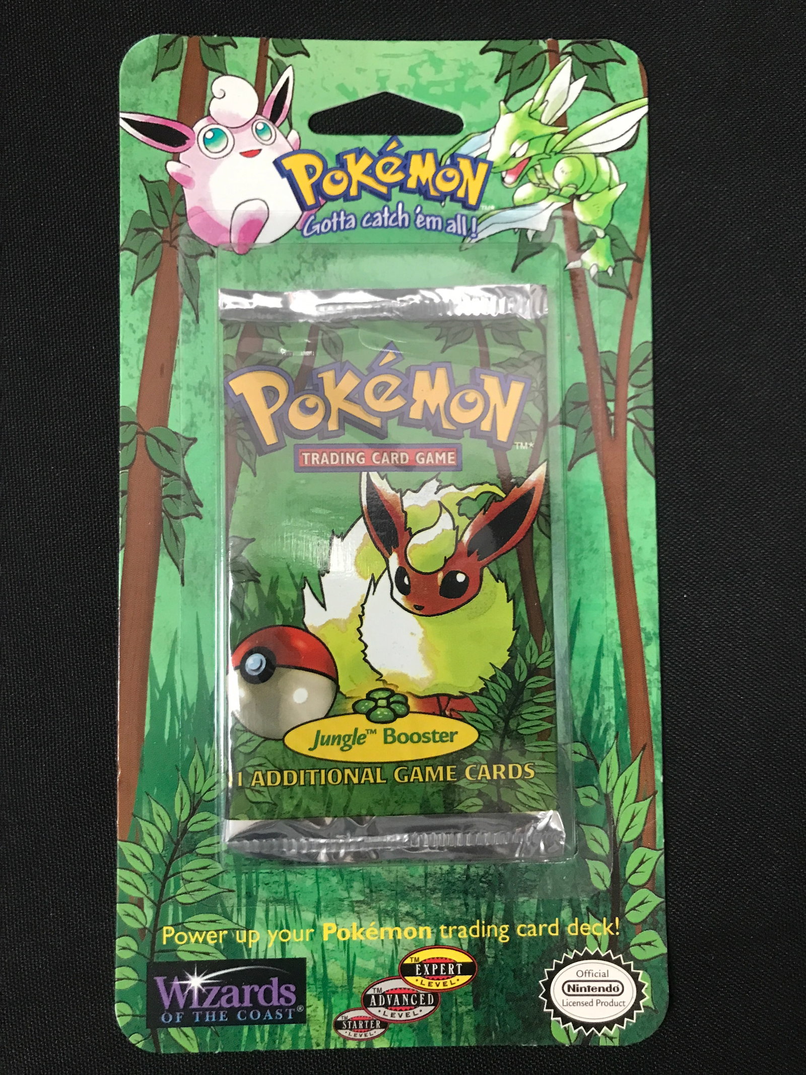 SEALED ON CARD 1999 POKEMON JUNGLE BOOSTER PACK (RETAIL VALUE 500.00-800.00): Prices are in Canadian Dollars