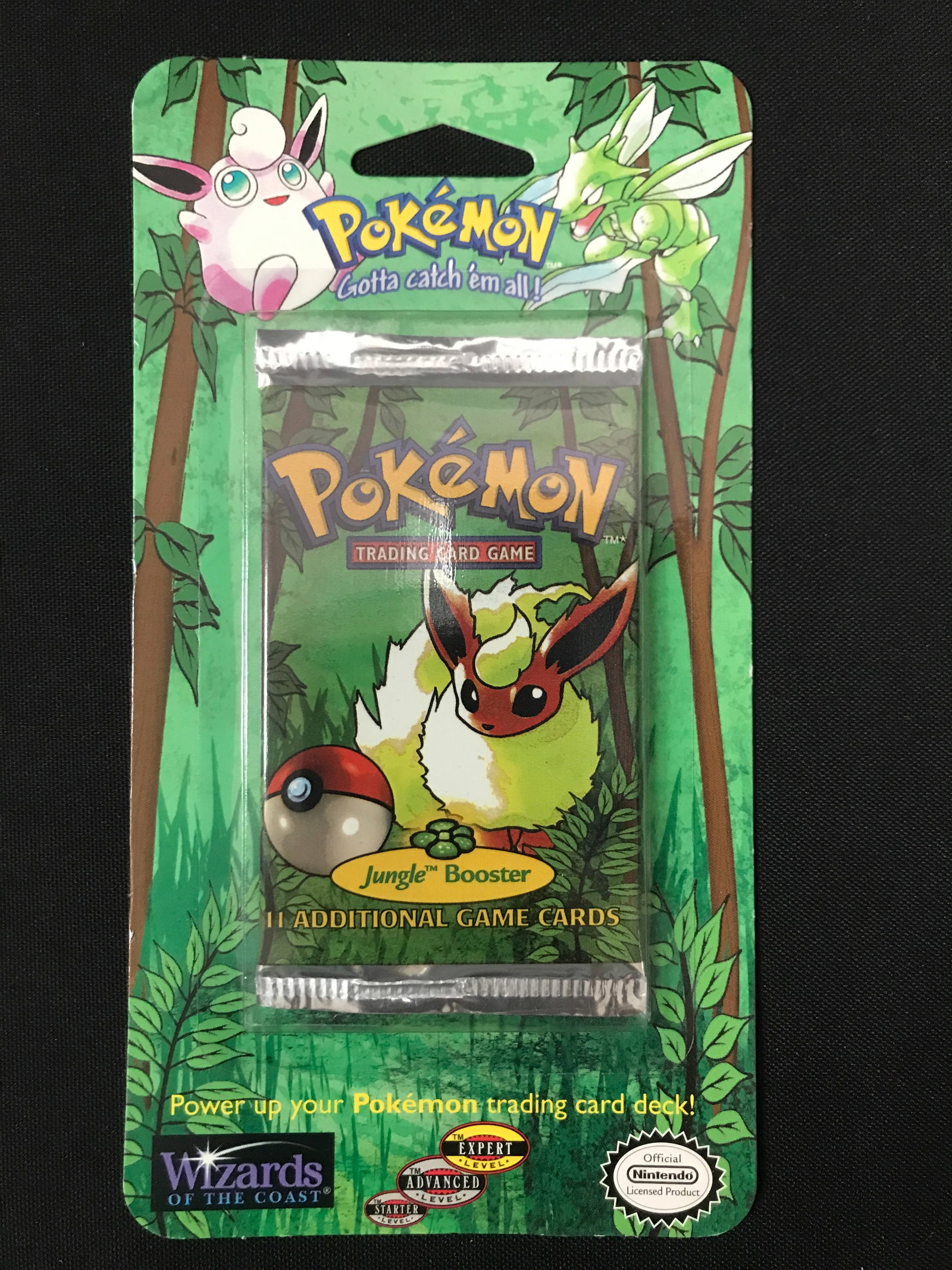 SEALED ON CARD 1999 POKEMON JUNGLE BOOSTER PACK (RETAIL VALUE 500.00-800.00): Prices are in Canadian Dollars