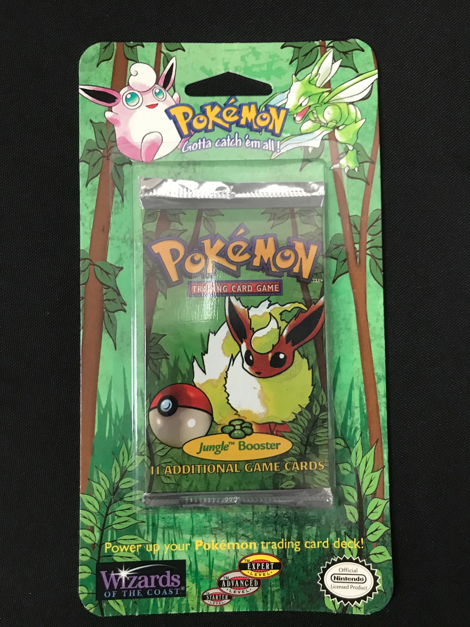 SEALED ON CARD 1999 POKEMON JUNGLE BOOSTER PACK (RETAIL VALUE 500.00-800.00): Prices are in Canadian Dollars