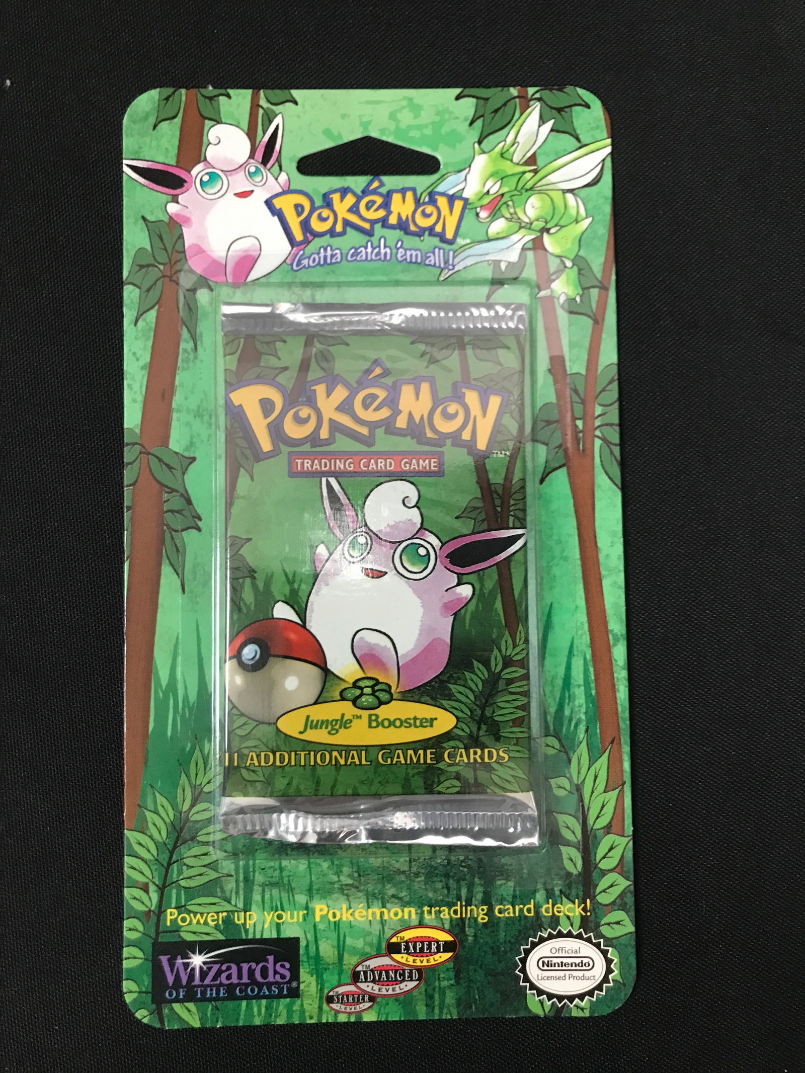 SEALED ON CARD 1999 POKEMON JUNGLE BOOSTER PACK (RETAIL VALUE 500.00-800.00): Prices are in Canadian Dollars
