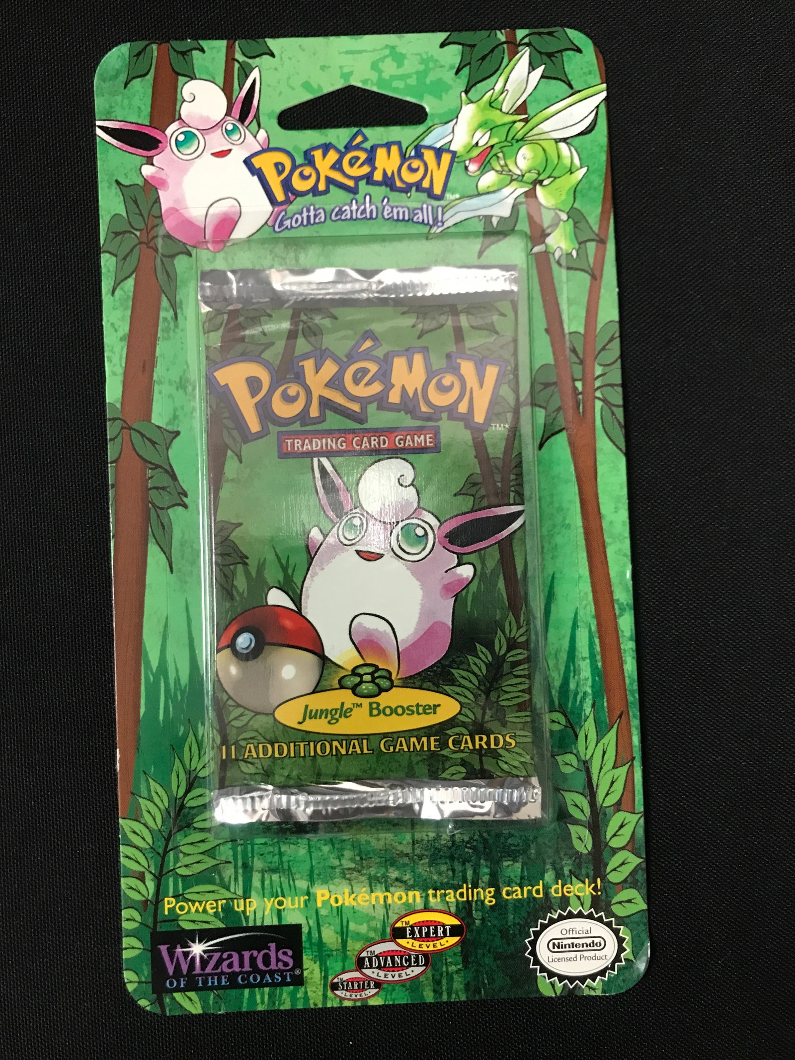 SEALED ON CARD 1999 POKEMON JUNGLE BOOSTER PACK (RETAIL VALUE 500.00-800.00): Prices are in Canadian Dollars