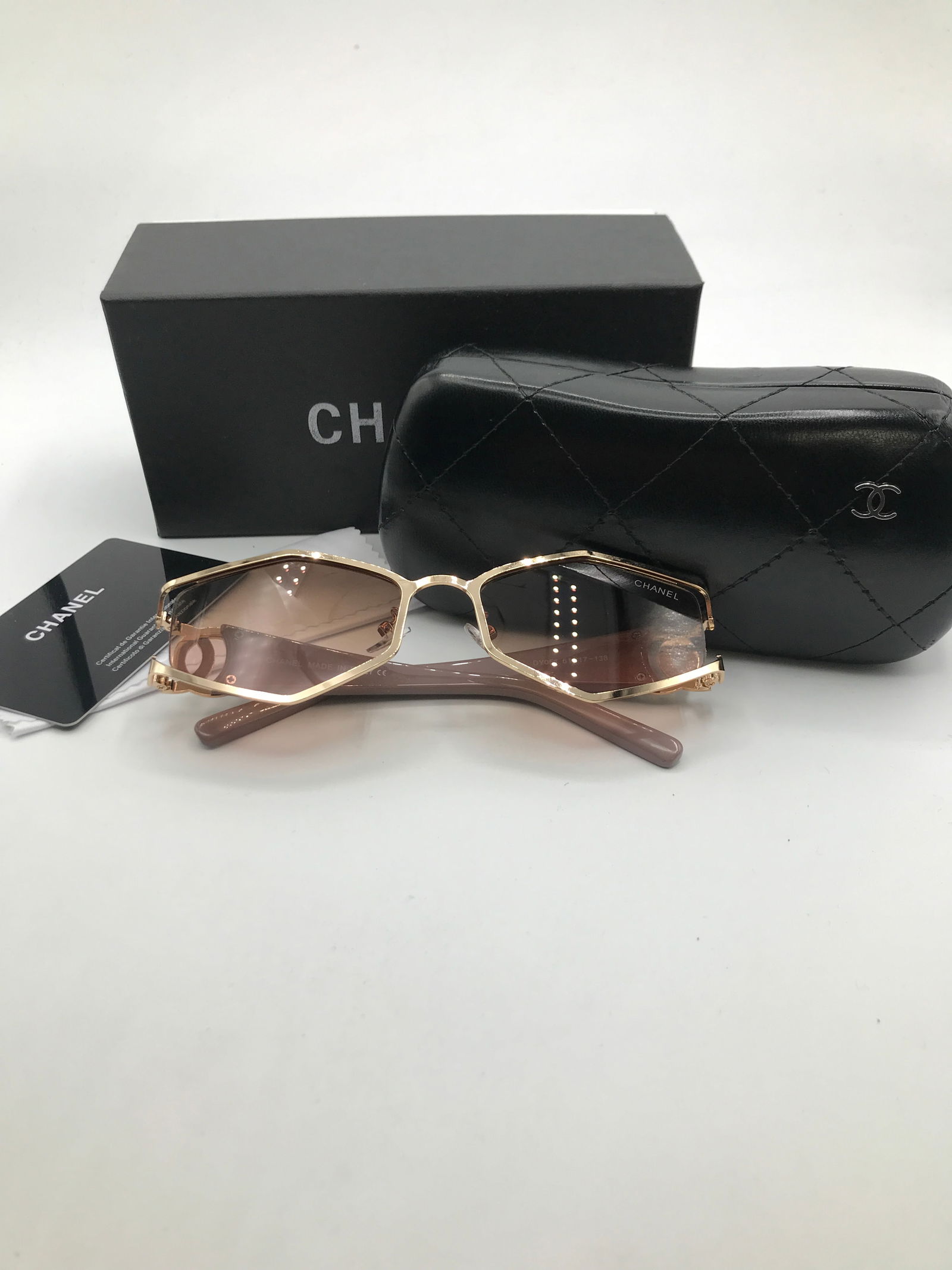 BRAND NEW SUNGLASSES WITH BOX AND ACCESSORIES: Prices are in Canadian dollars