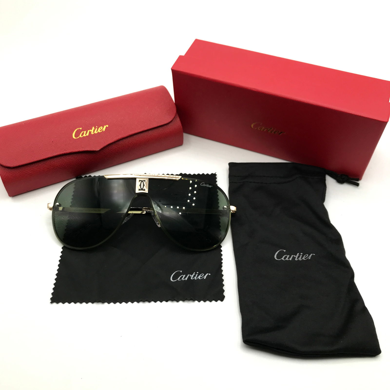 BRAND NEW SUNGLASSES WITH BOX AND ACCESSORIES: Prices are in Canadian dollars