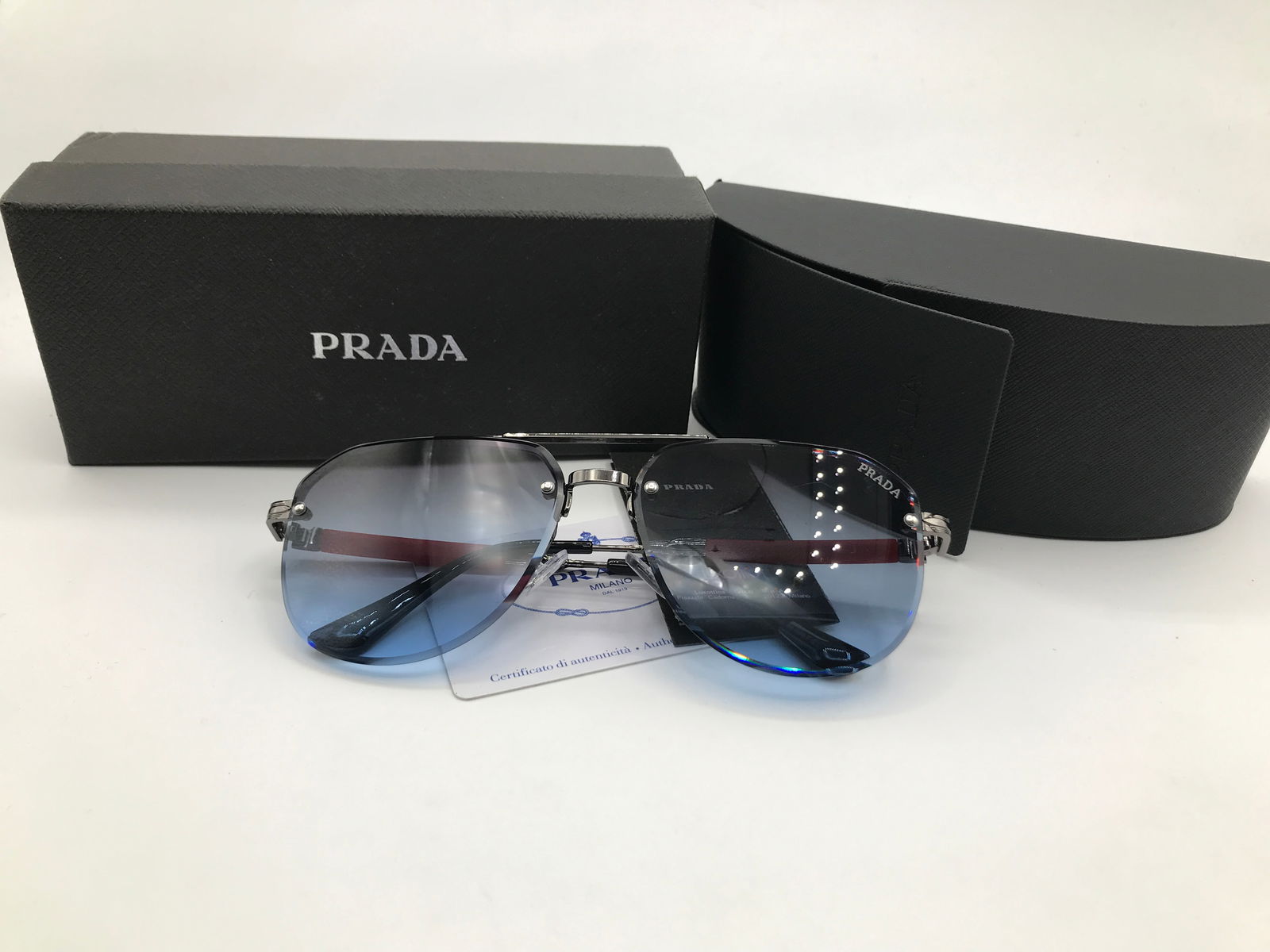 BRAND NEW SUNGLASSES WITH BOX AND ACCESSORIES: Prices are in Canadian dollars