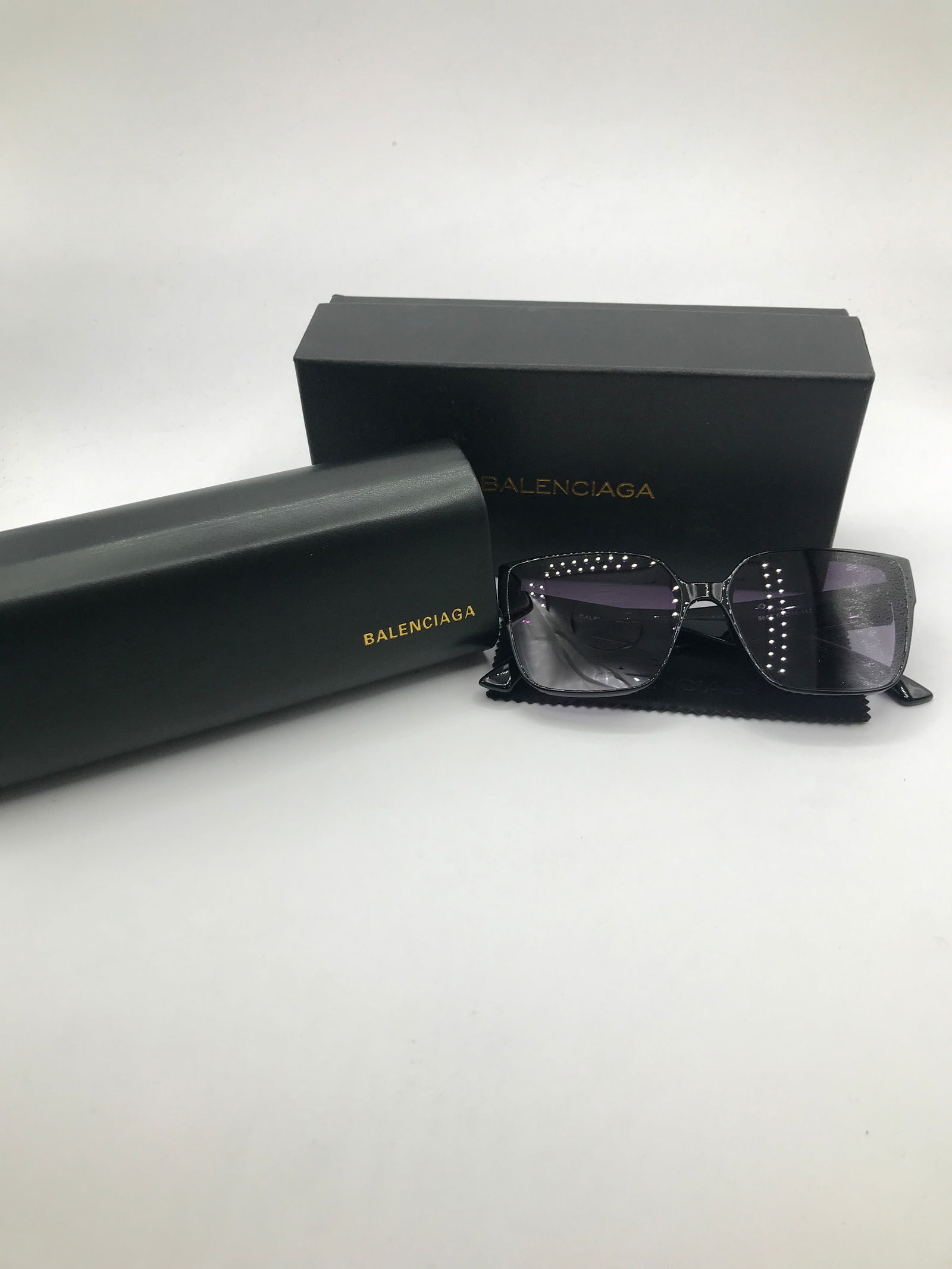 BRAND NEW SUNGLASSES WITH BOX AND ACCESSORIES: Prices are in Canadian dollars