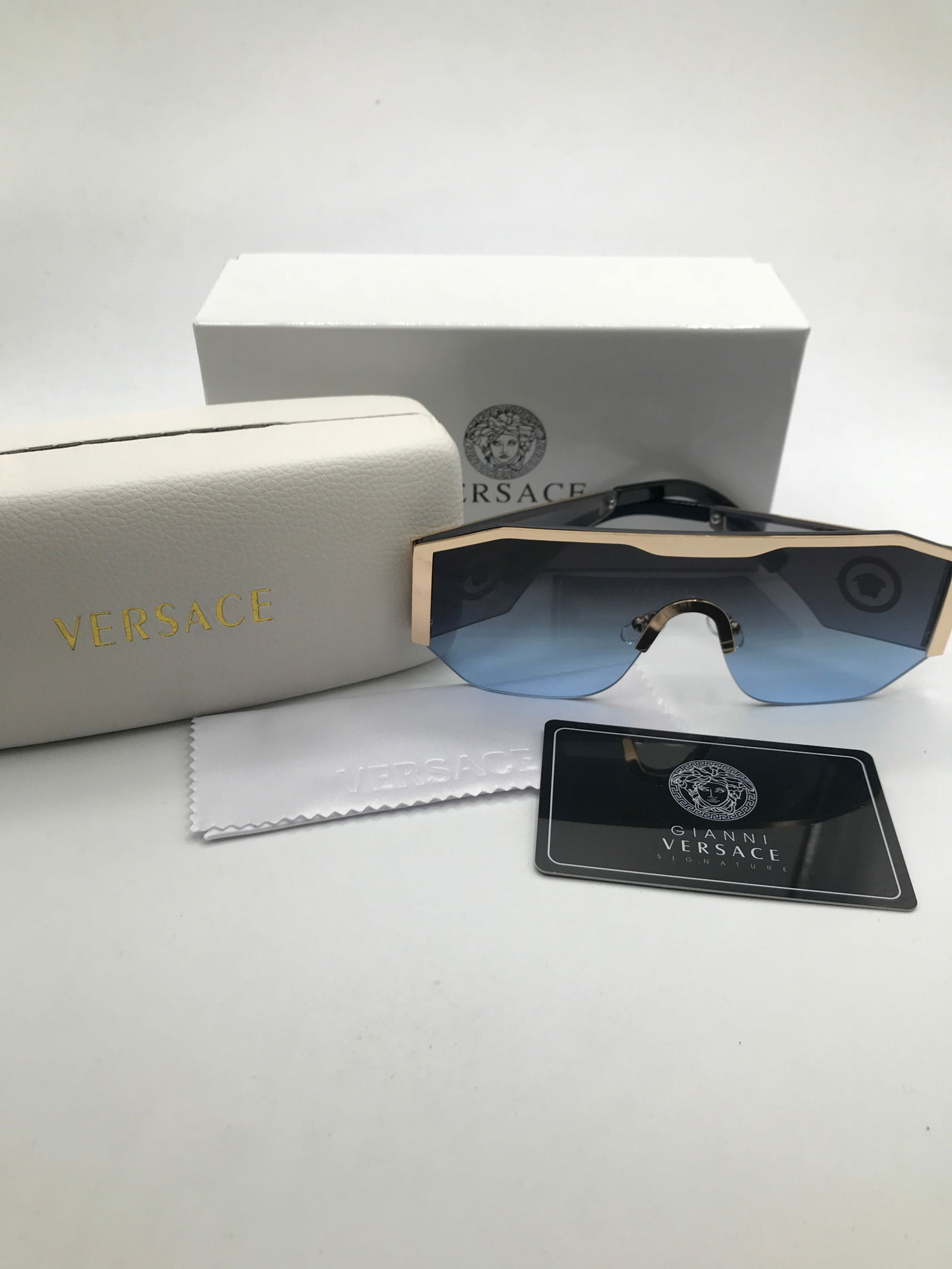 BRAND NEW SUNGLASSES WITH BOX AND ACCESSORIES: Prices are in Canadian dollars