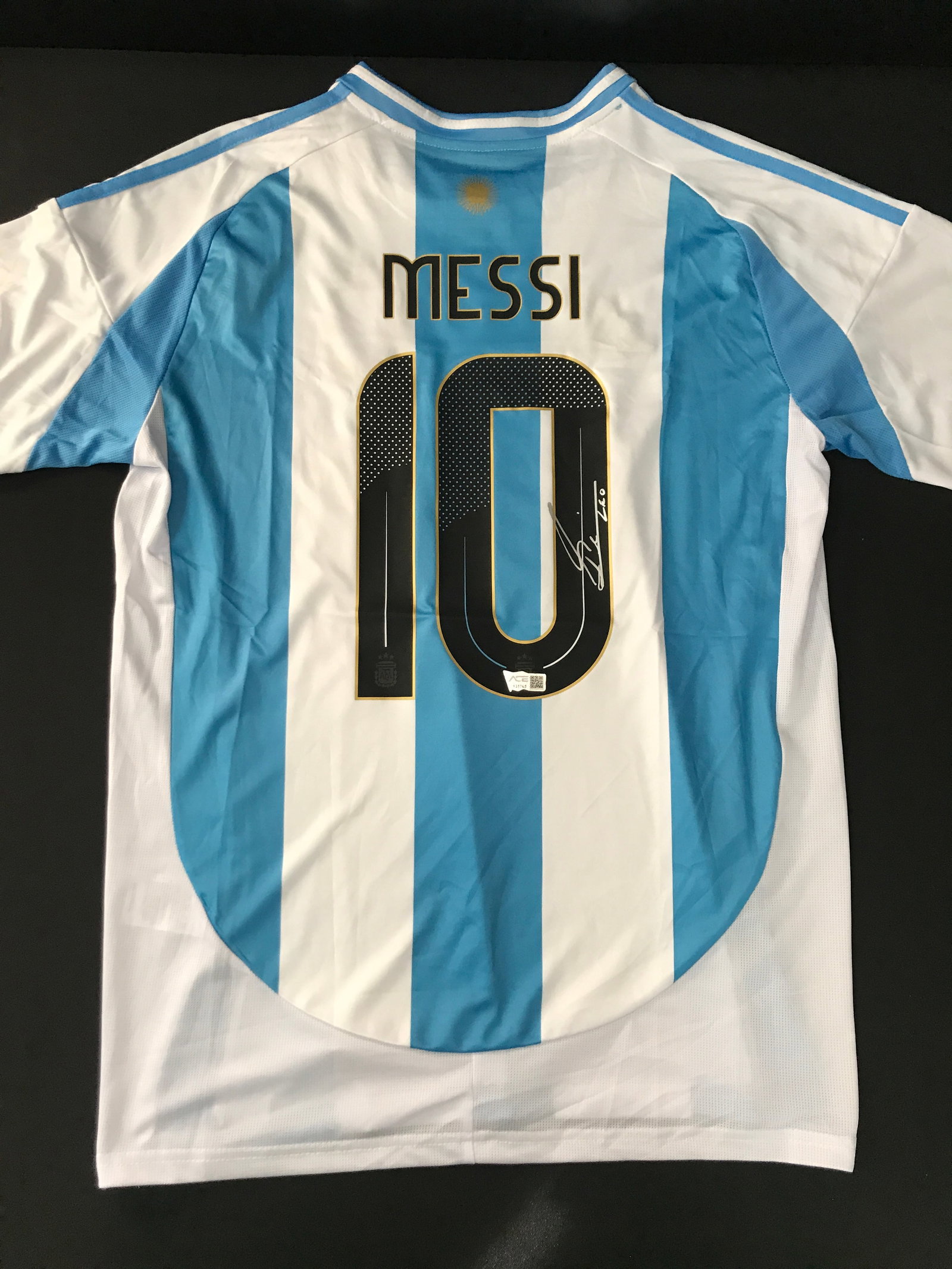 LIONEL MESSI SIGNED ARGENTINA SOCCER JERSEY - ACE COA: Prices are in Canadian dollars