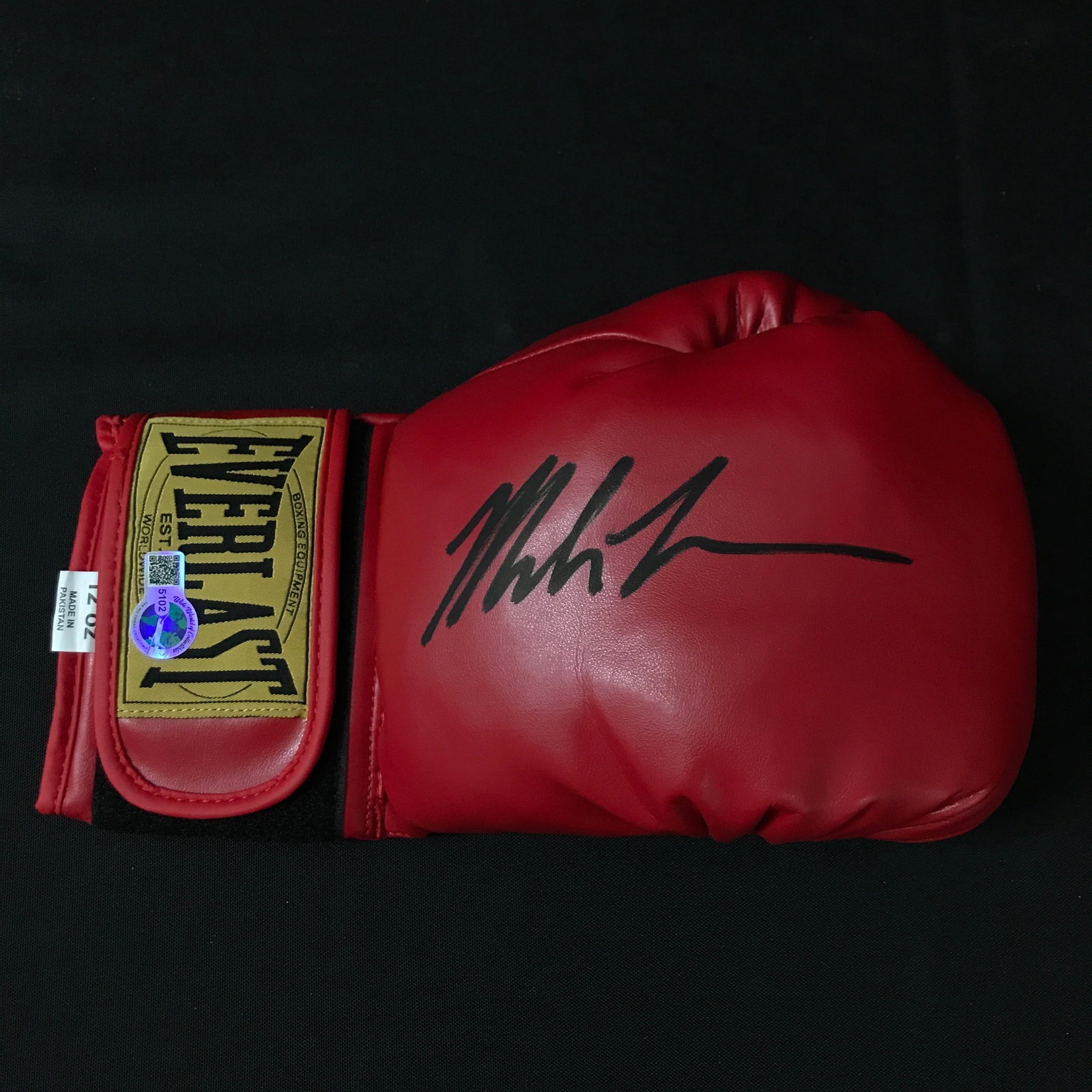MIKE TYSON SIGNED RED BOXING GLOVE - WWOC COA: Prices are in Canadian dollars