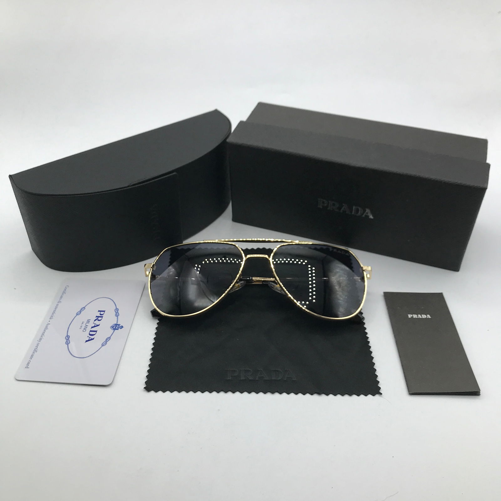 BRAND NEW SUNGLASSES WITH BOX AND ACCESSORIES: Prices are in Canadian dollars