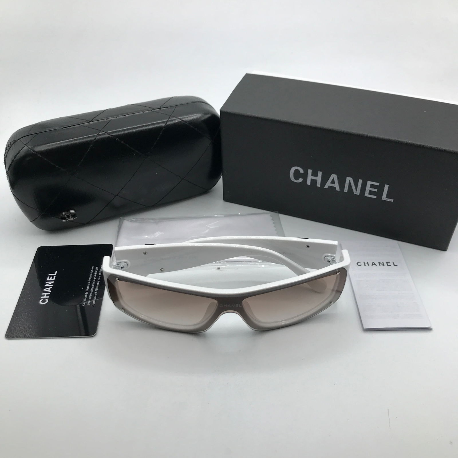 BRAND NEW SUNGLASSES WITH BOX AND ACCESSORIES: Prices are in Canadian dollars