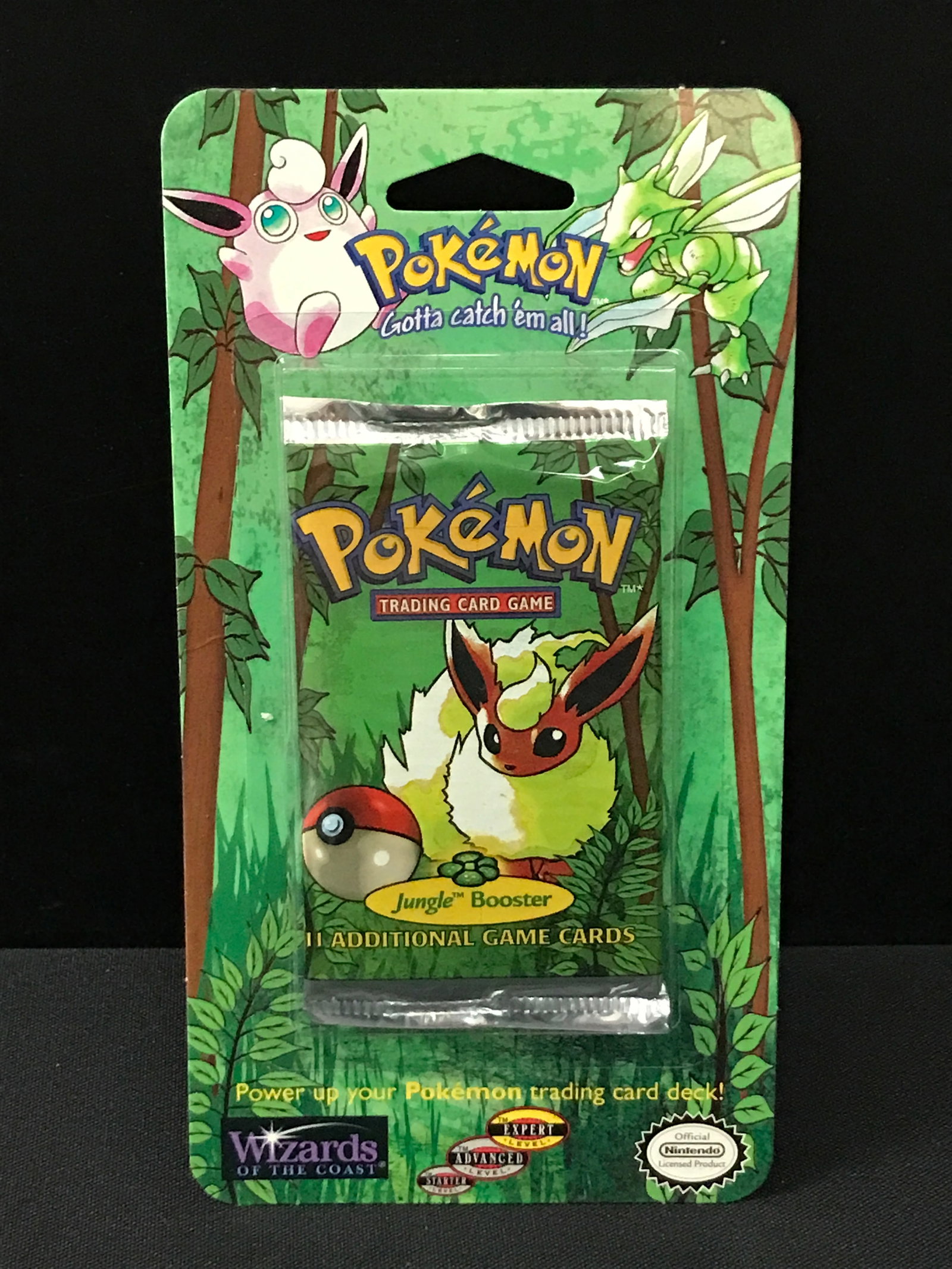 SEALED ON CARD 1999 POKEMON JUNGLE BOOSTER PACK (RETAIL VALUE 500.00-800.00): Prices are in Canadian dollars