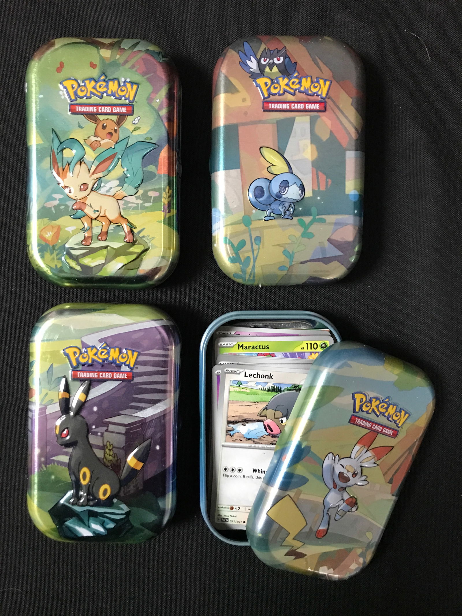 LOT OF 4 POKEMON TCG TIN BOXES WITH CARDS (1 of 1)