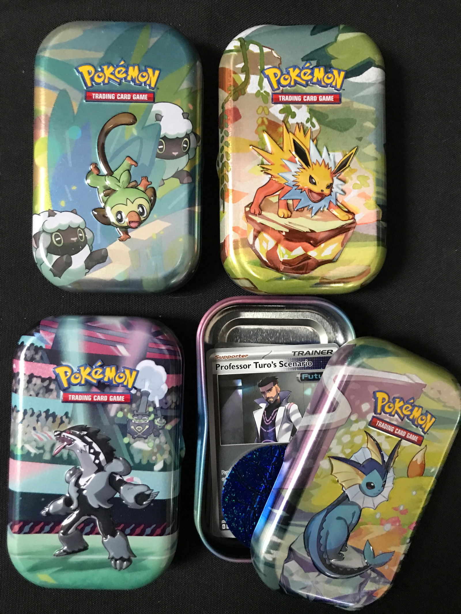 LOT OF 4 POKEMON TCG TIN BOXES WITH CARDS (1 of 1)