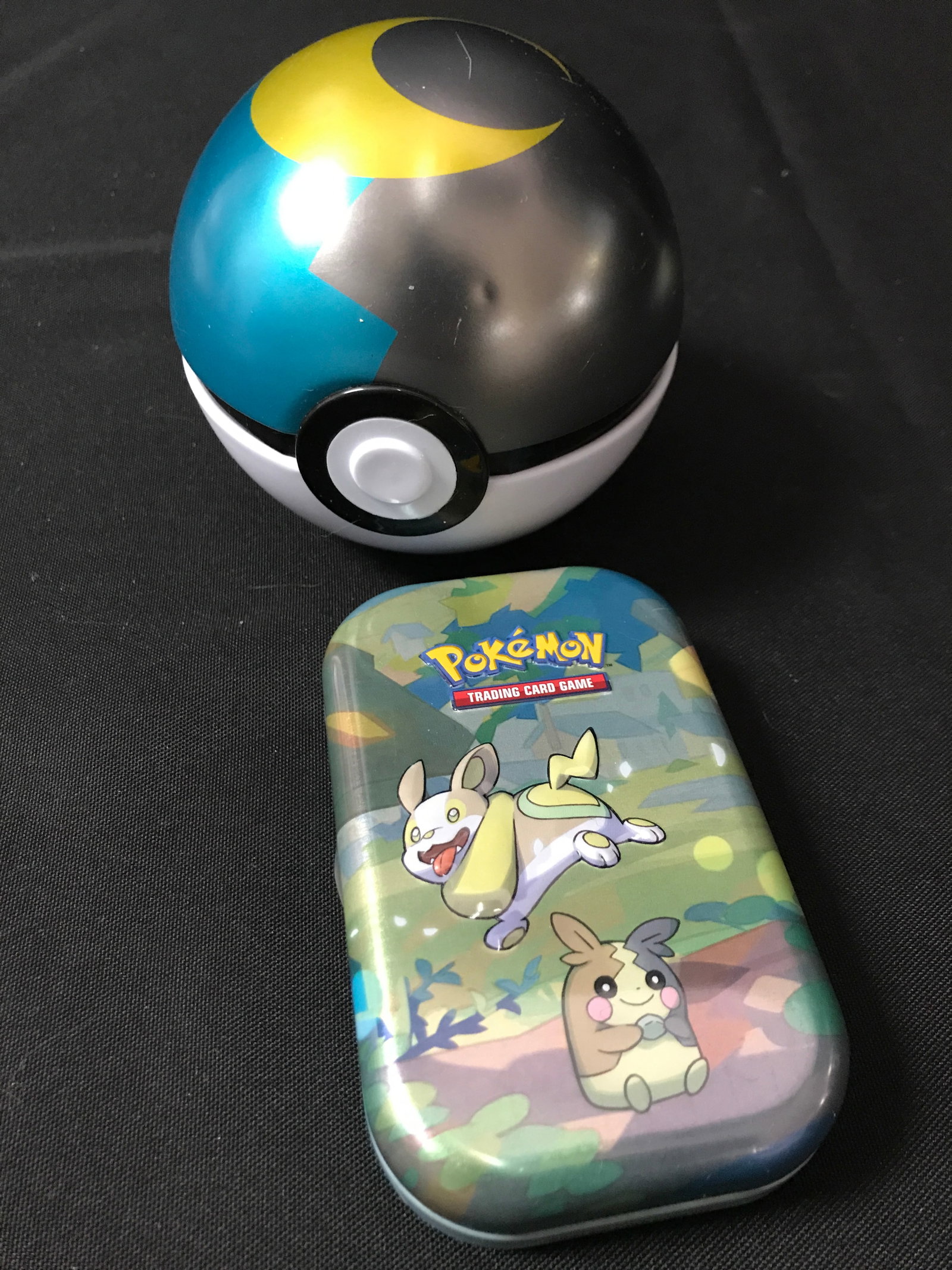 1 TIN BOX OF POKEMON TCG AND 1 POKE BALL: Prices are in Canadian dollars