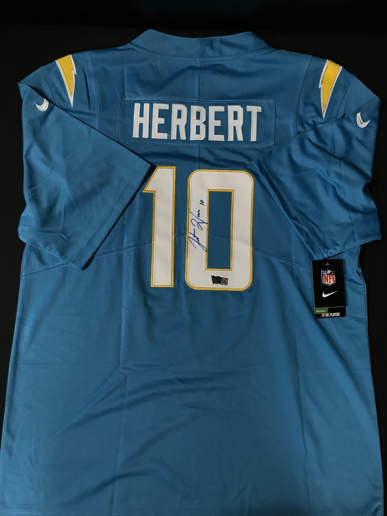 JUSTIN HERBERT SIGNED LOS ANGELES CHARGERS JERSEY - ACE COA: Prices are in Canadian dollars