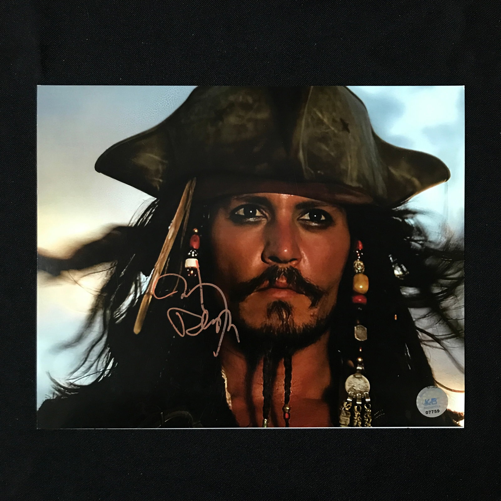 JOHNNY DEPP SIGNED PIRATES OF THE CARIBBEAN 8X10 - KB COA: Prices are in Canadian dollars