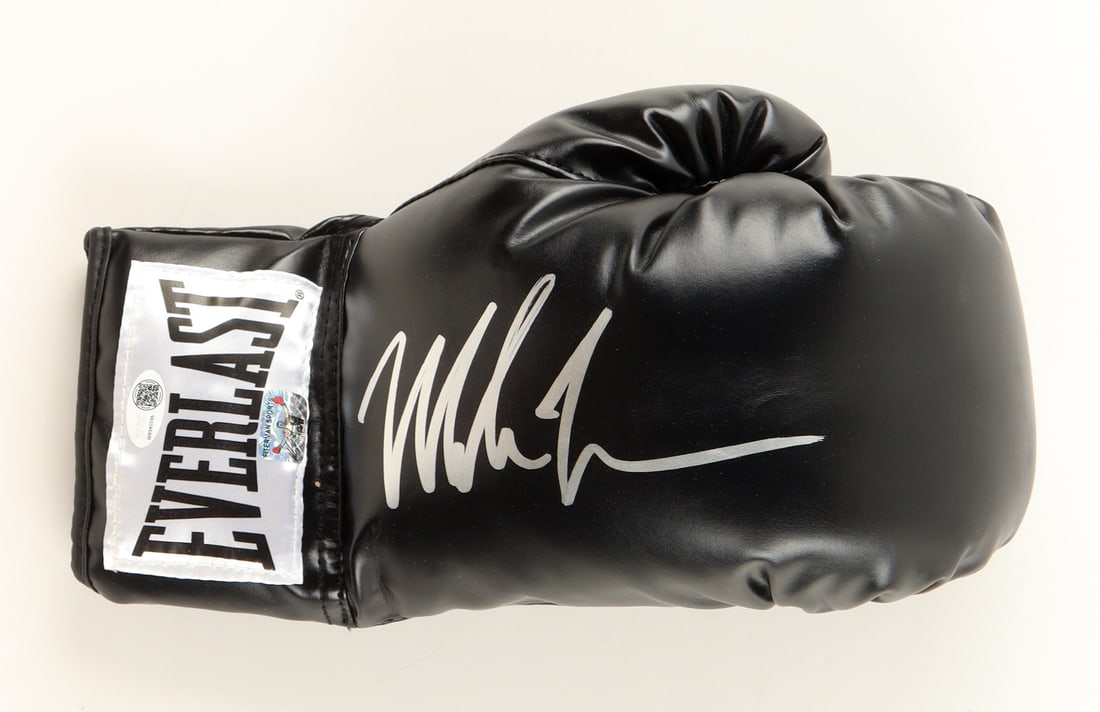 MIKE TYSON SIGNED BLACK EVERLAST BOXING GLOVE - WWOC AND FITERMAN SPORTS COA: Prices are in Canadian dollars