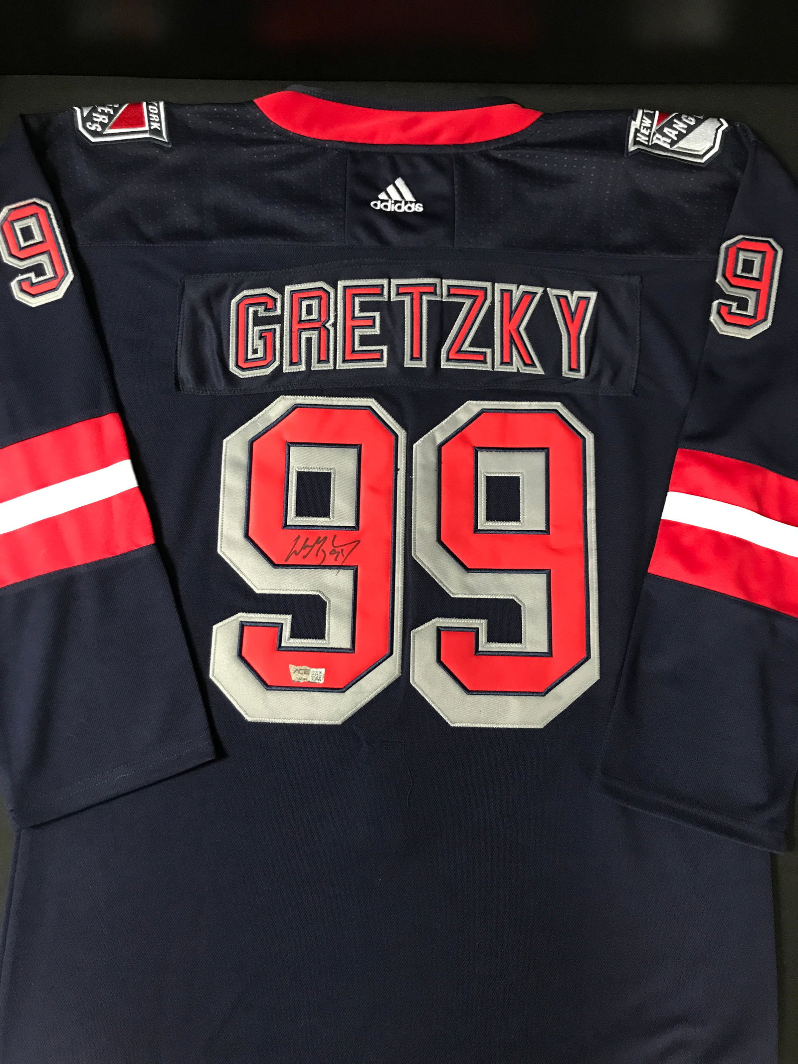 WAYNE GRETZKY SIGNED NEW YORK RANGERS JERSEY - ACE COA: Prices are in Canadian dollars