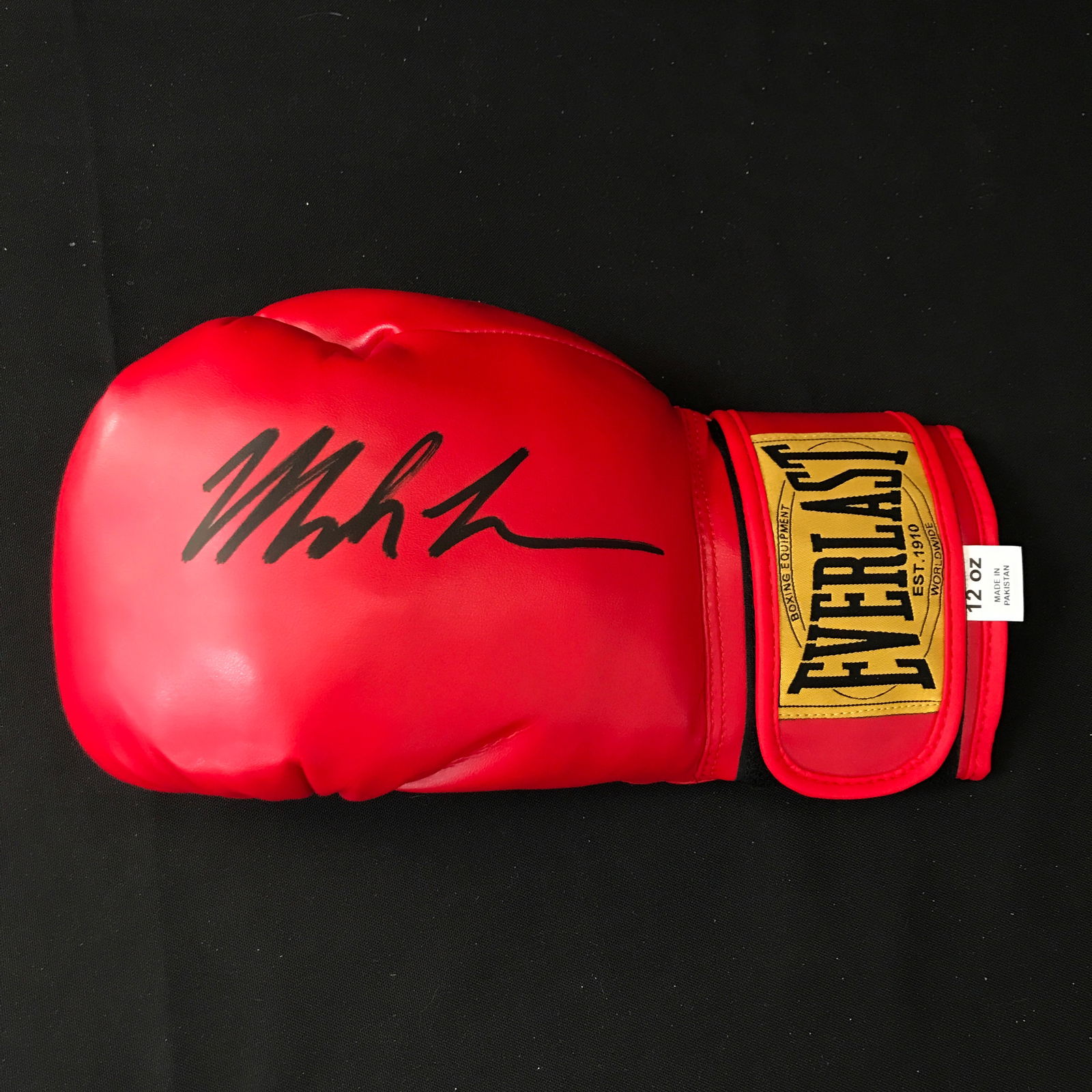 MIKE TYSON SIGNED RED EVERLAST BOXING GLOVE - WWOC COA: Prices are in Canadian dollars