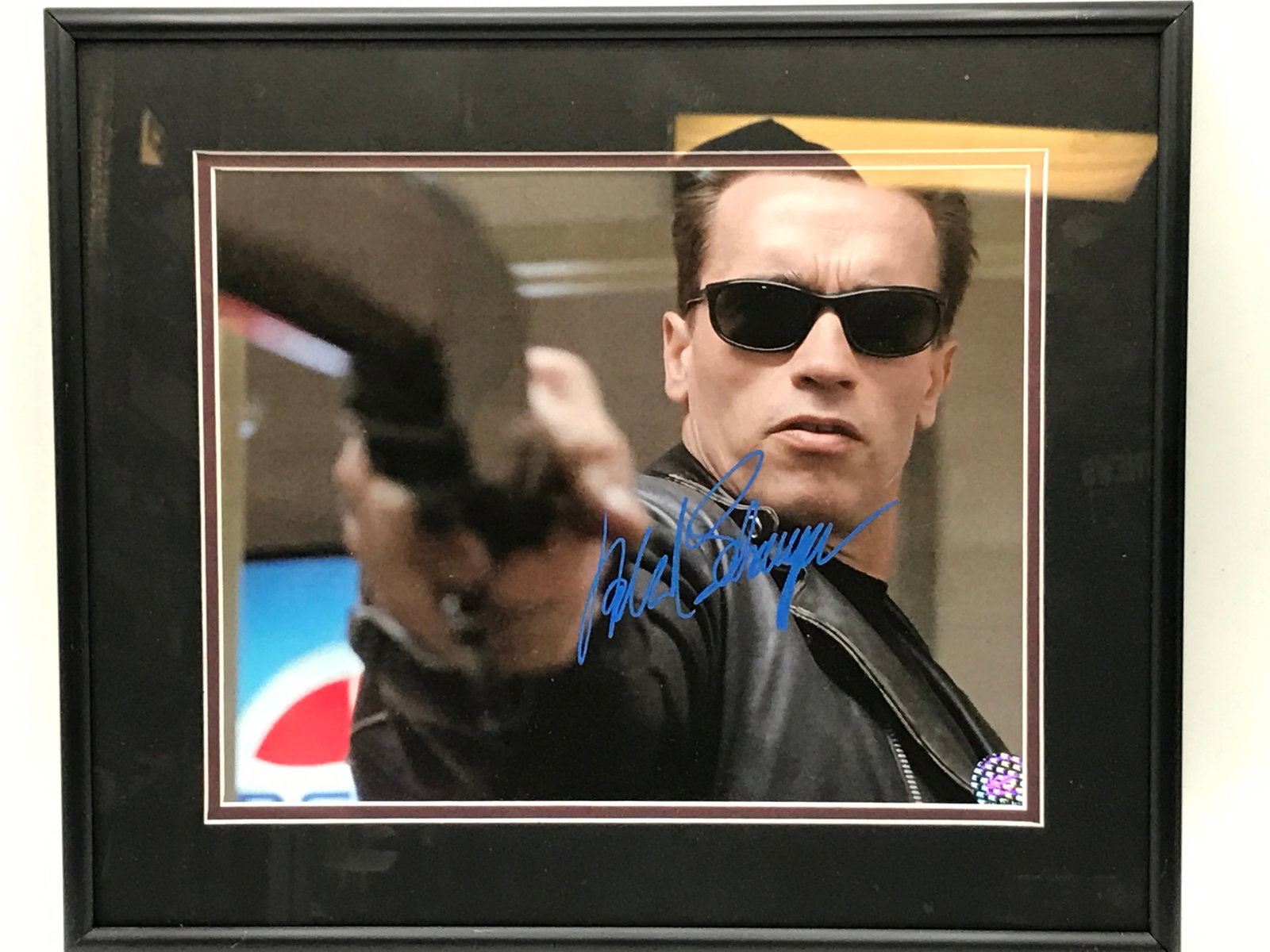 ARNOLD SCWARZENEGGER SIGNED AND FRAMED TERMINATOR 8X10 - KB COA: Prices are in Canadian dollars