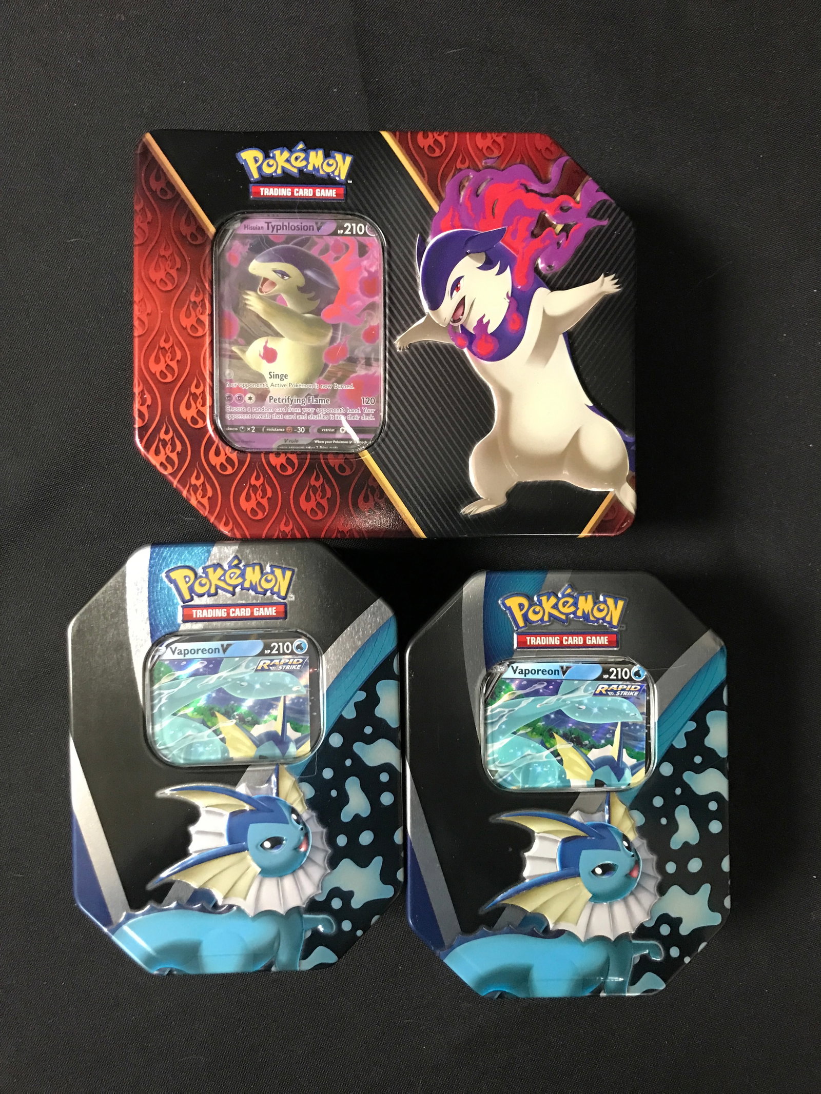 LOT OF 3 POKEMON TCG TINS: Prices are in Canadian dollars