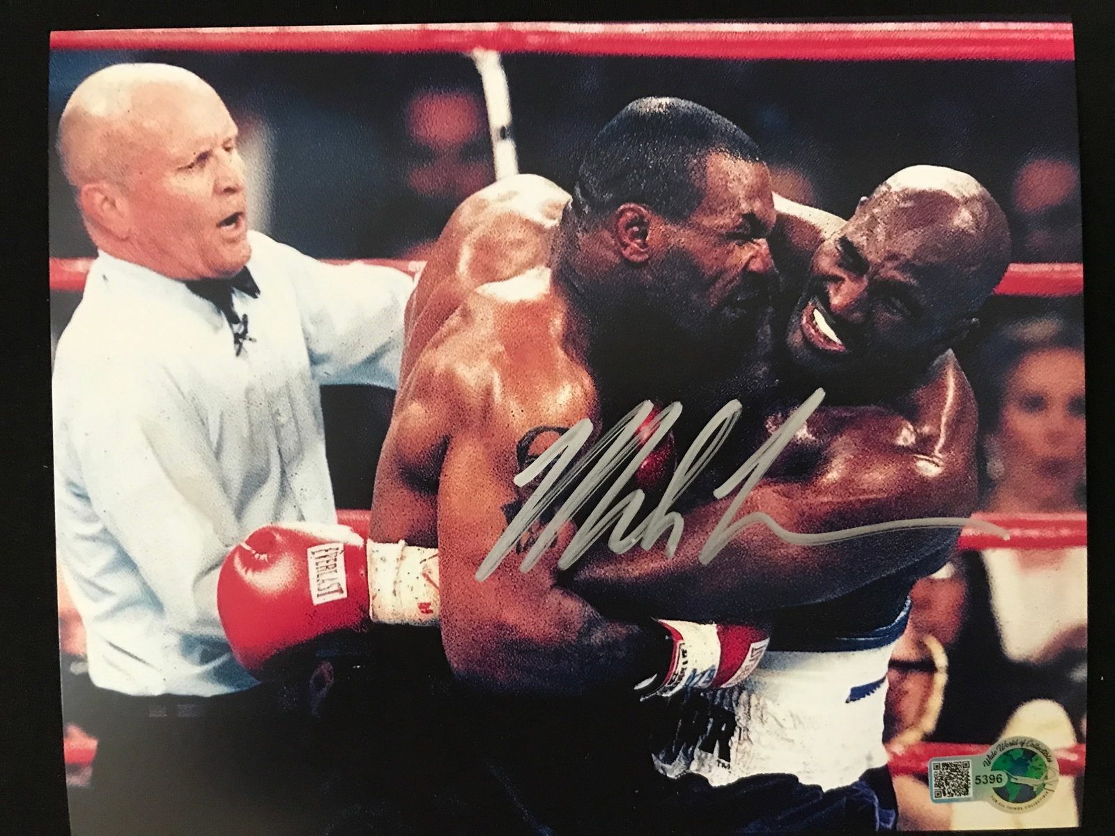 MIKE TYSON SIGNED EAR BITE 8X10 - WWOC COA: Prices are in Canadian dollars