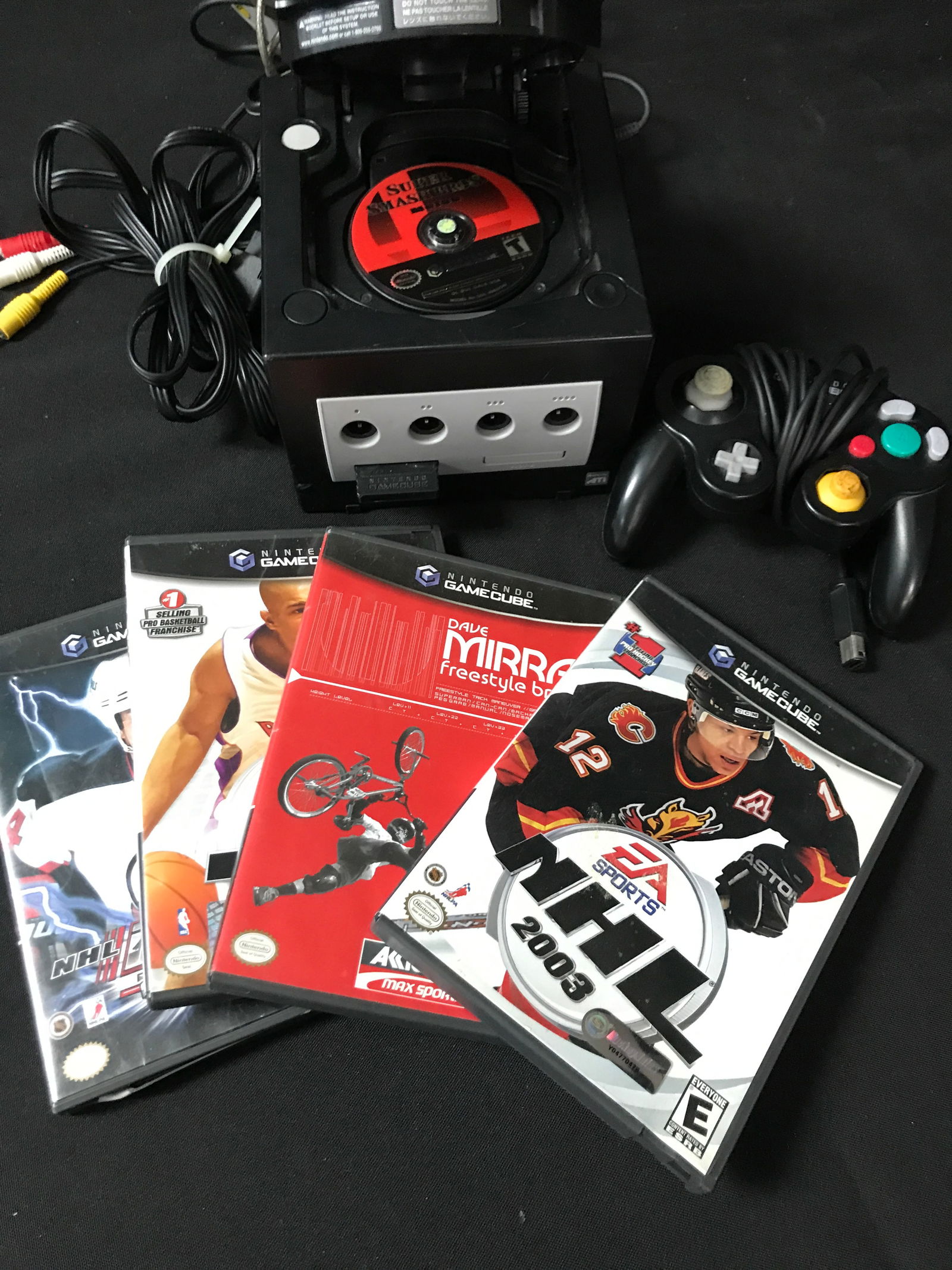 COMPLETE WORKING NINTENDO GAME CUBE CONSOLE WITH GAMES: Prices are in Canadian dollars