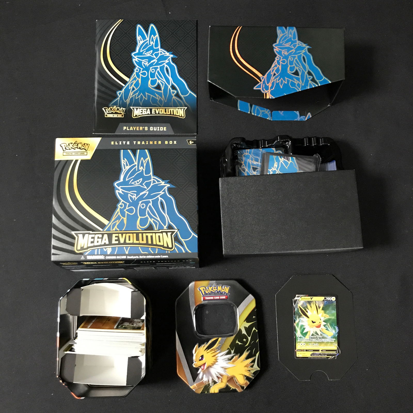 POKEMON TCG MEGA EVOLUTION ETB AND POKEMON TCG TIN: Prices are in Canadian dollars