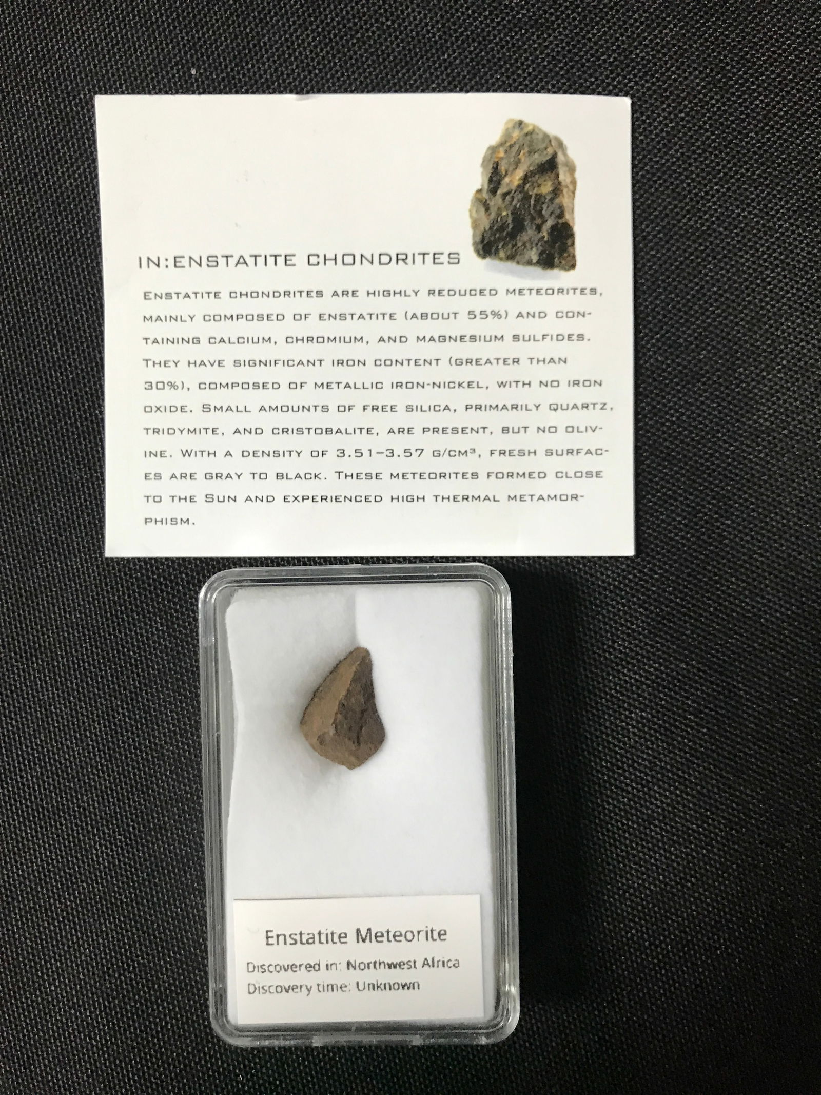 ENSTATITE METEORITE IN CASE NORTHWEST AFRICA (1 of 1)