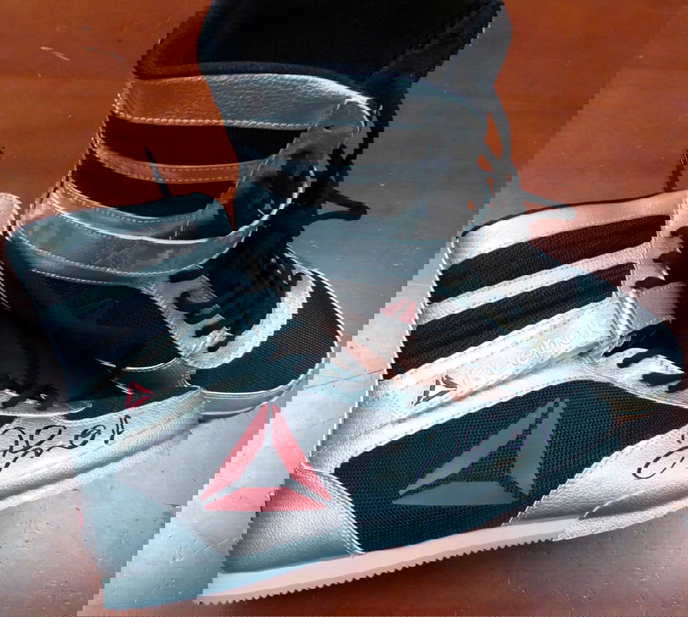 Floyd Mayweather Jr. Autographed Reebok Silver Boxing Shoes Beckett: Prices are in Canadian dollars