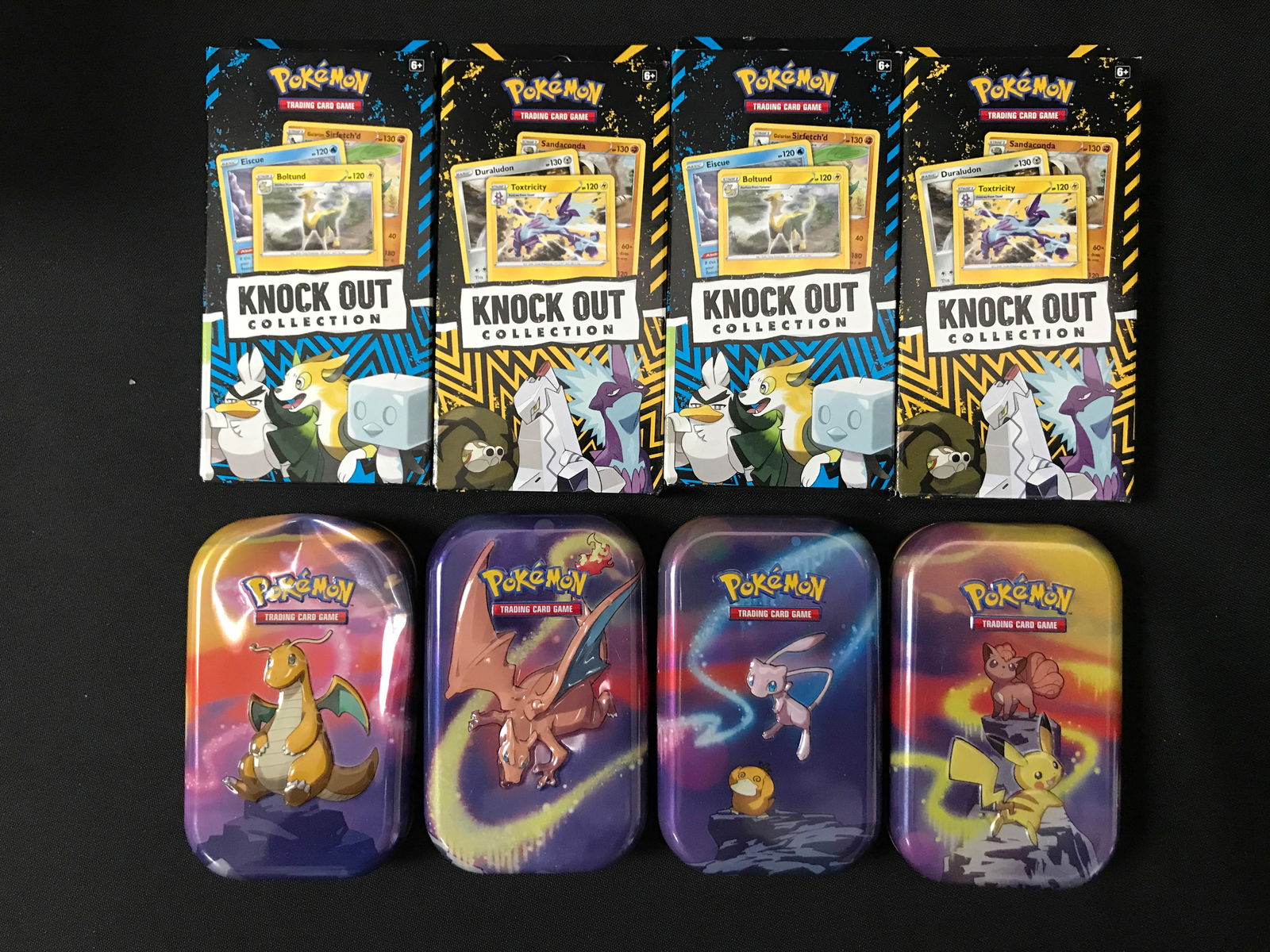 LOT OF 8 POKEMON TCG TINS INCLUDING 4 KNOCK OUT COLLECTION: Prices are in Canadian dollars
