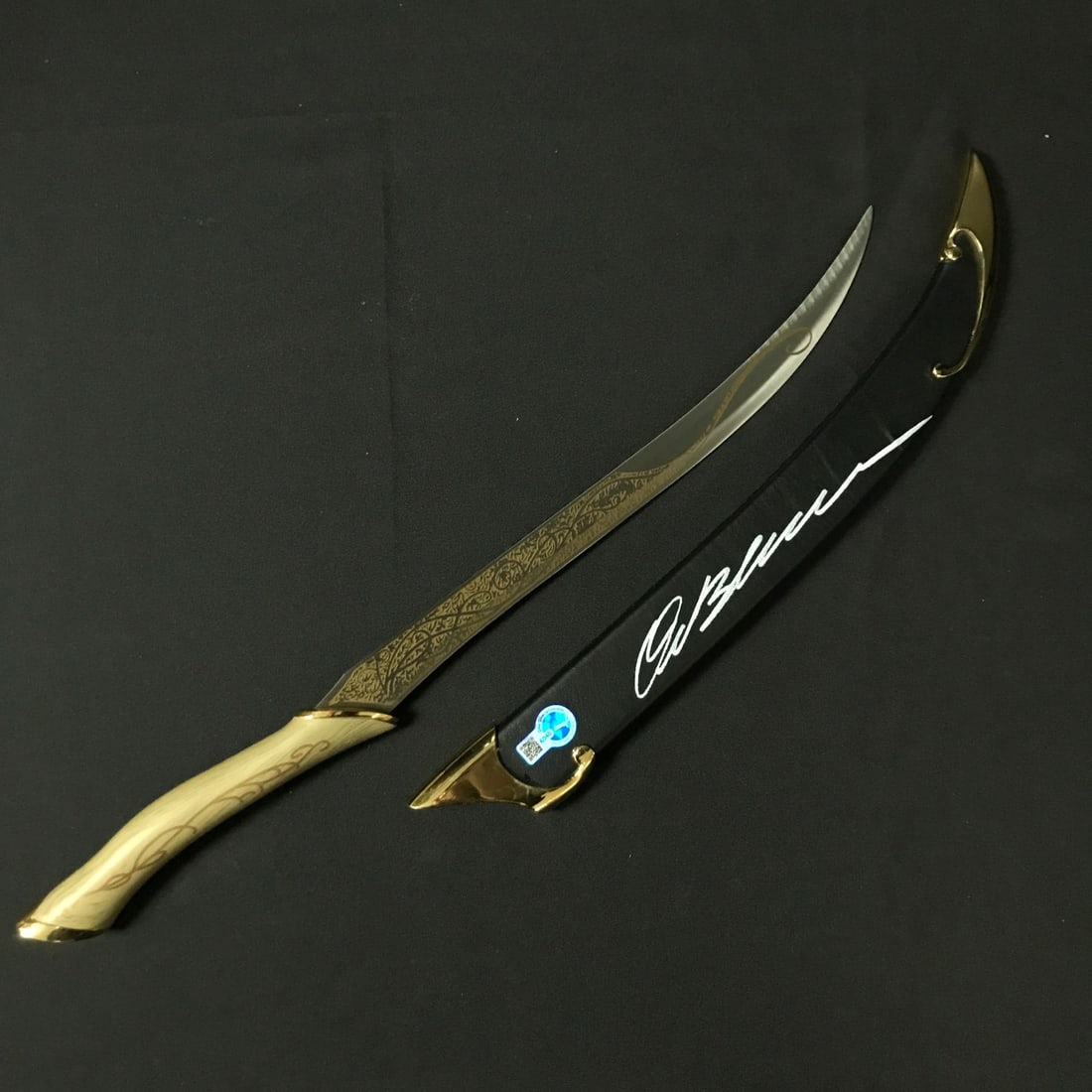 ORLANDO BLOOM SIGNED SWORD SHEATH - WWOC COA (1 of 3)