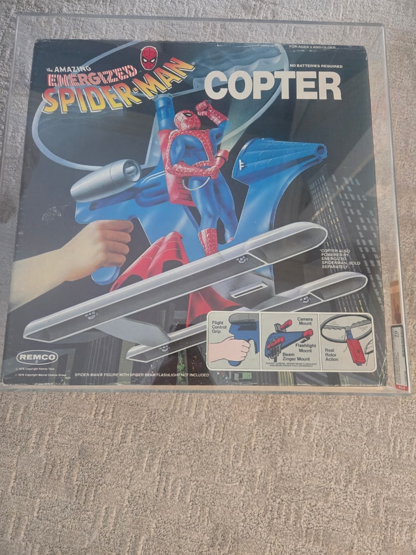 AFA 80 GRADED 1978 THE AMAZING ENERGIZED SPIDERMAN COPTER IN ORIGINAL PACKAGING: Prices are in Canadian dollars