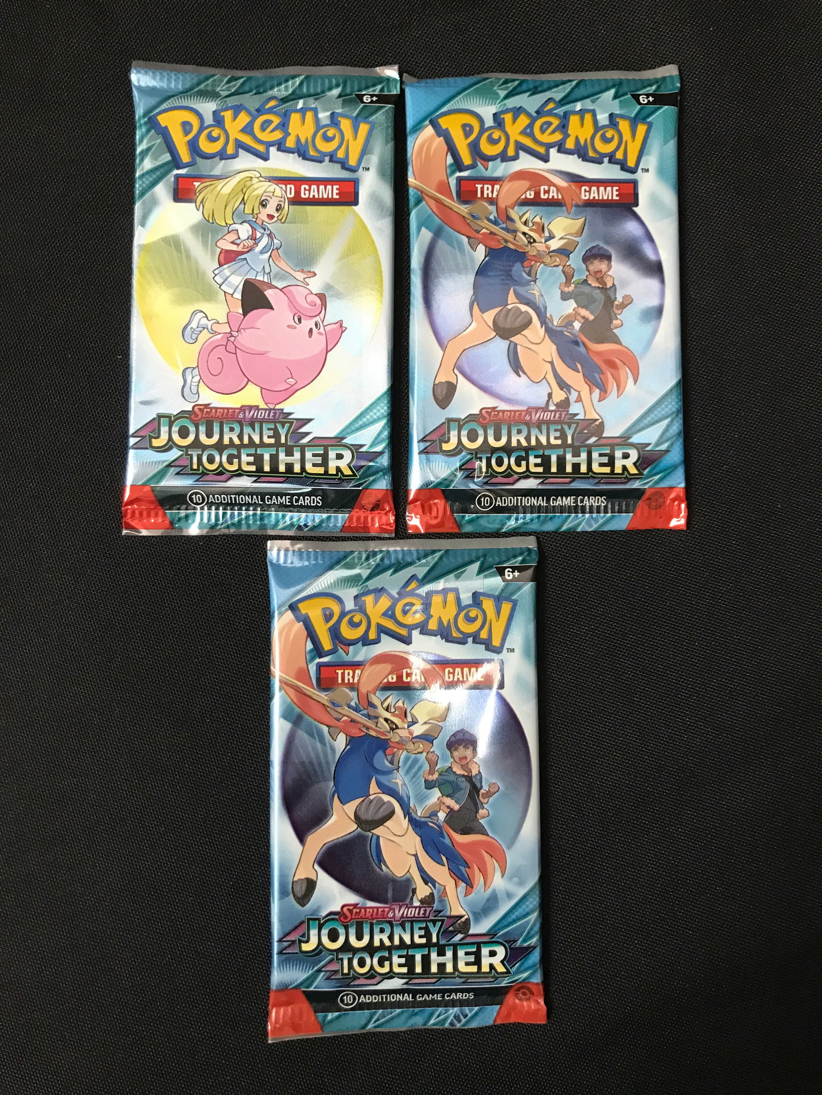 LOT OF 3 POKEMON TCG SCARLET & VIOLET JOURNEY TOGETHER SEALED BOOSTER PACKS: Prices are in Canadian dollars