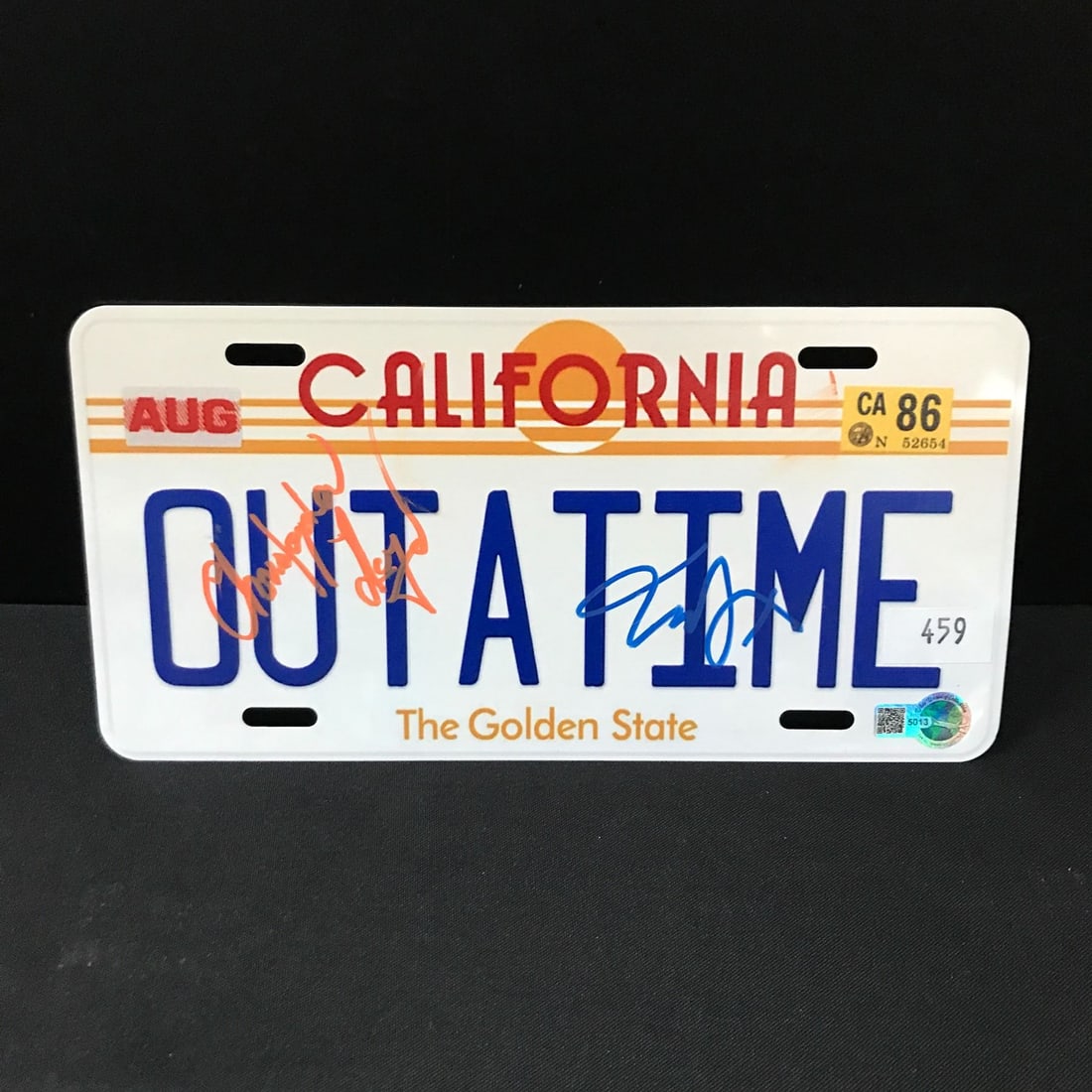 MICHAEL J FOX AND CHRISTOPHER LLOYD DUAL SIGNED OUTATIME LICENSE PLATE - WWOC COA (1 of 3)