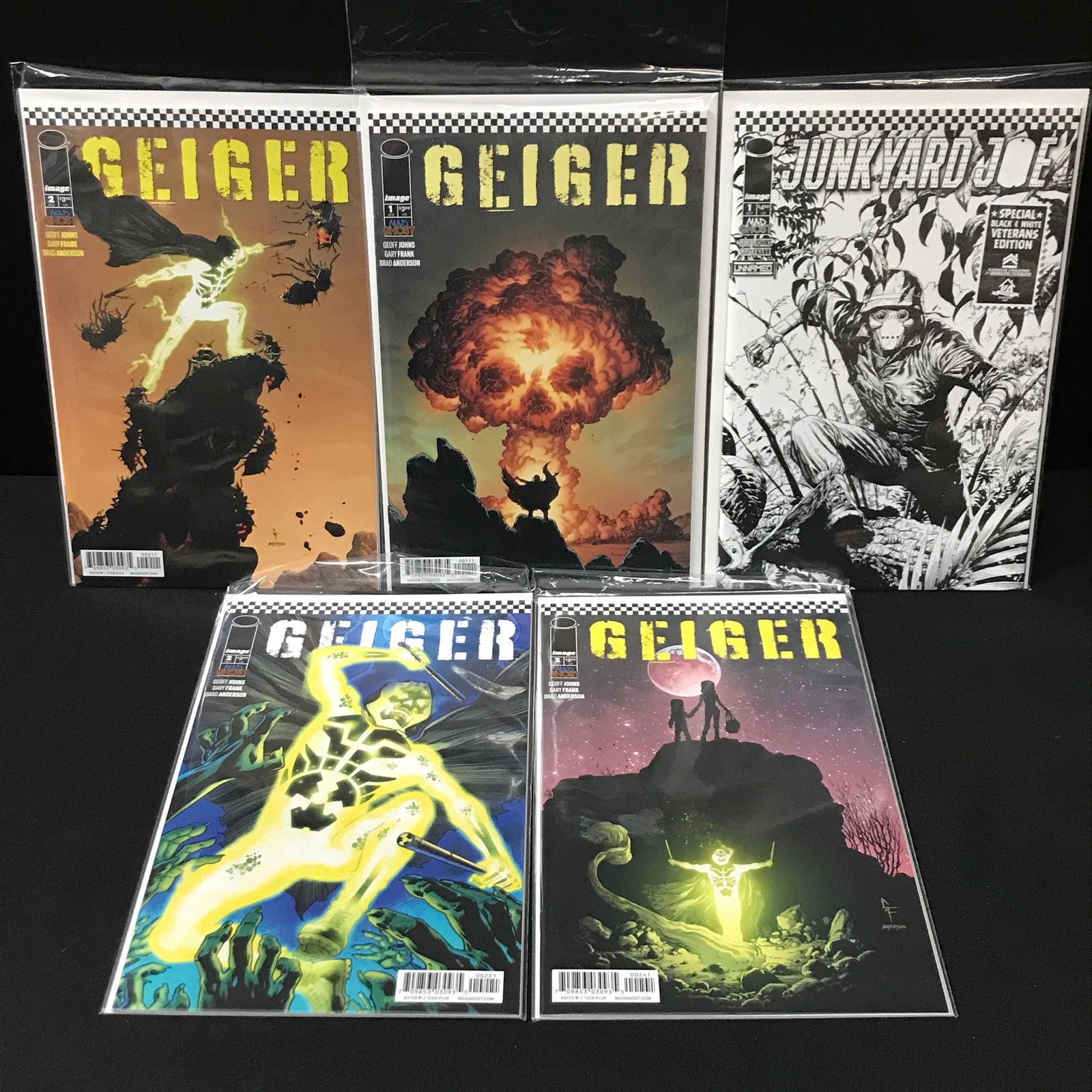 LOT OF 5 COMICS INDLUDING 4 GEIGER COMICS - IMAGE (1 of 1)