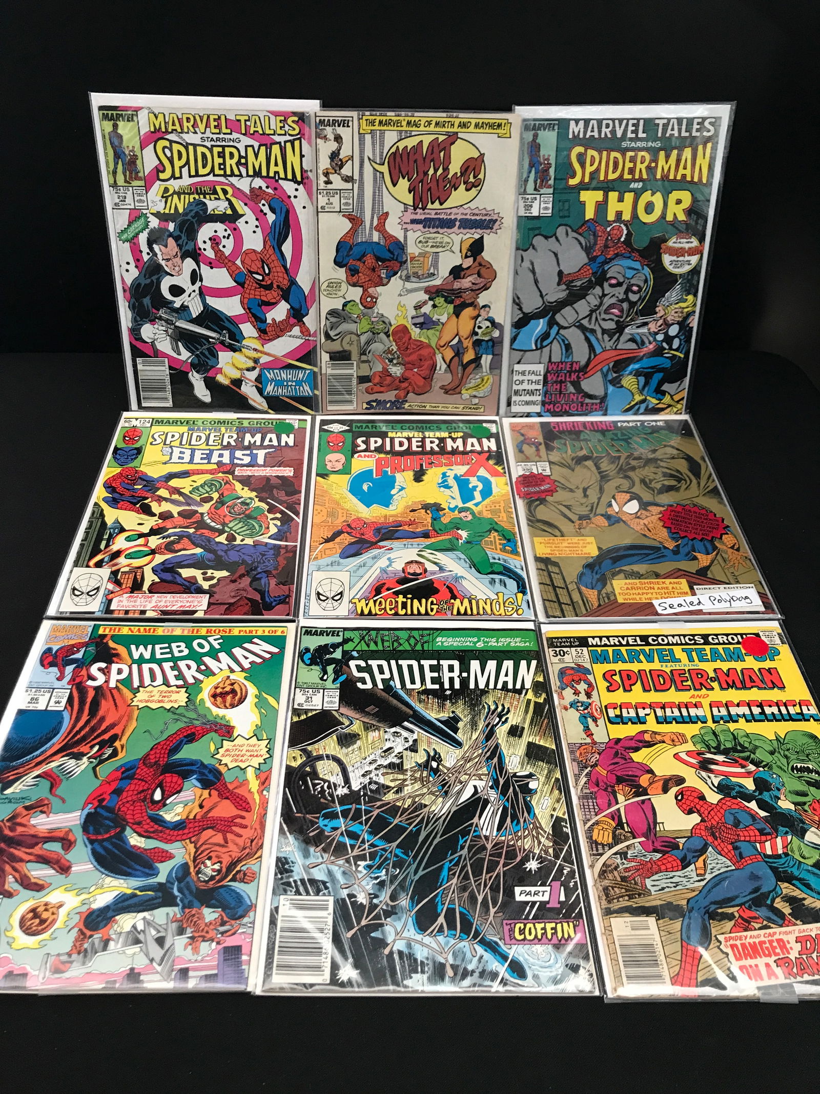 LOT OF 9 COMICS FEATURING SPIDERMAN - MARVEL COMICS: Prices are in Canadian dollars